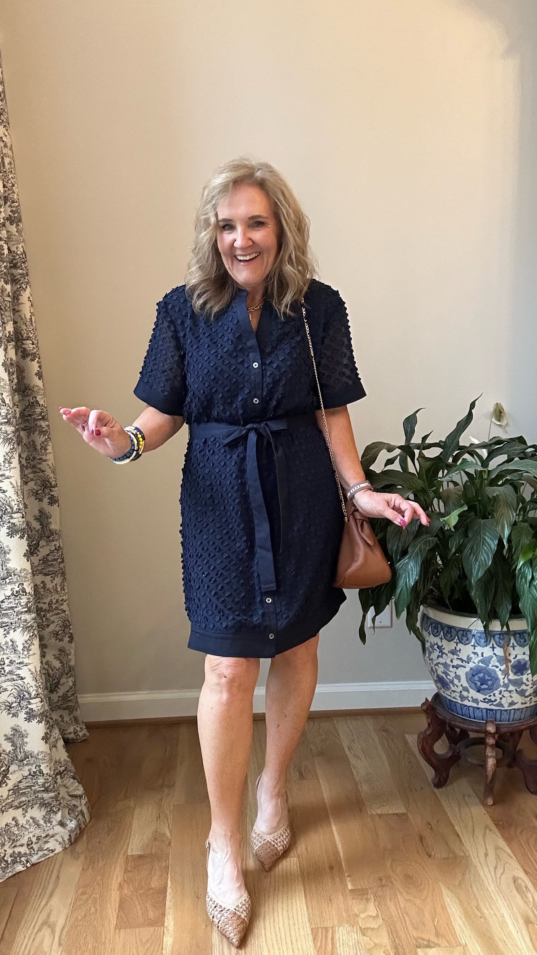 New arrivals at AVARA. this dress! Wear with the tie or not. I’m wearing a medium. Size up if in between. 
15% off code at AVARA NANETTE15

Slingbacks are a splurge. But so beautiful. And comfy bc the woven leather works on the shape of your foot. 

Quince bag! 

Love the caramel brown with the navy. 

Rehearsal dinner wedding guest dress graduation dress navy dress 

#LTKWatchNow #LTKOver40 #LTKWedding