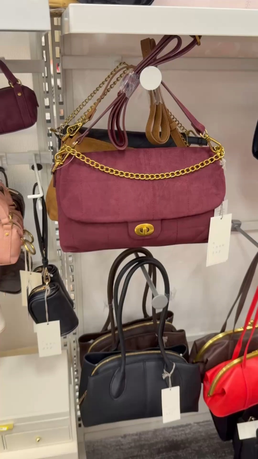 This bag looks SO much more expensive than it is 😍🍂 The rich burgundy, suede look + gold chain detail make it such a good Target find for fall. An easy way to make even the simplest outfit feel more elevated!

wedding guest dress summer plus size, fall outfits women, teacher outfits, country concert outfits, date night outfits, back to school outfits teen, concert outfit ideas, fall wedding guest dresses, business casual workwear, work outfits

#LTKootd #LTKWorkwear #LTKSeasonal
