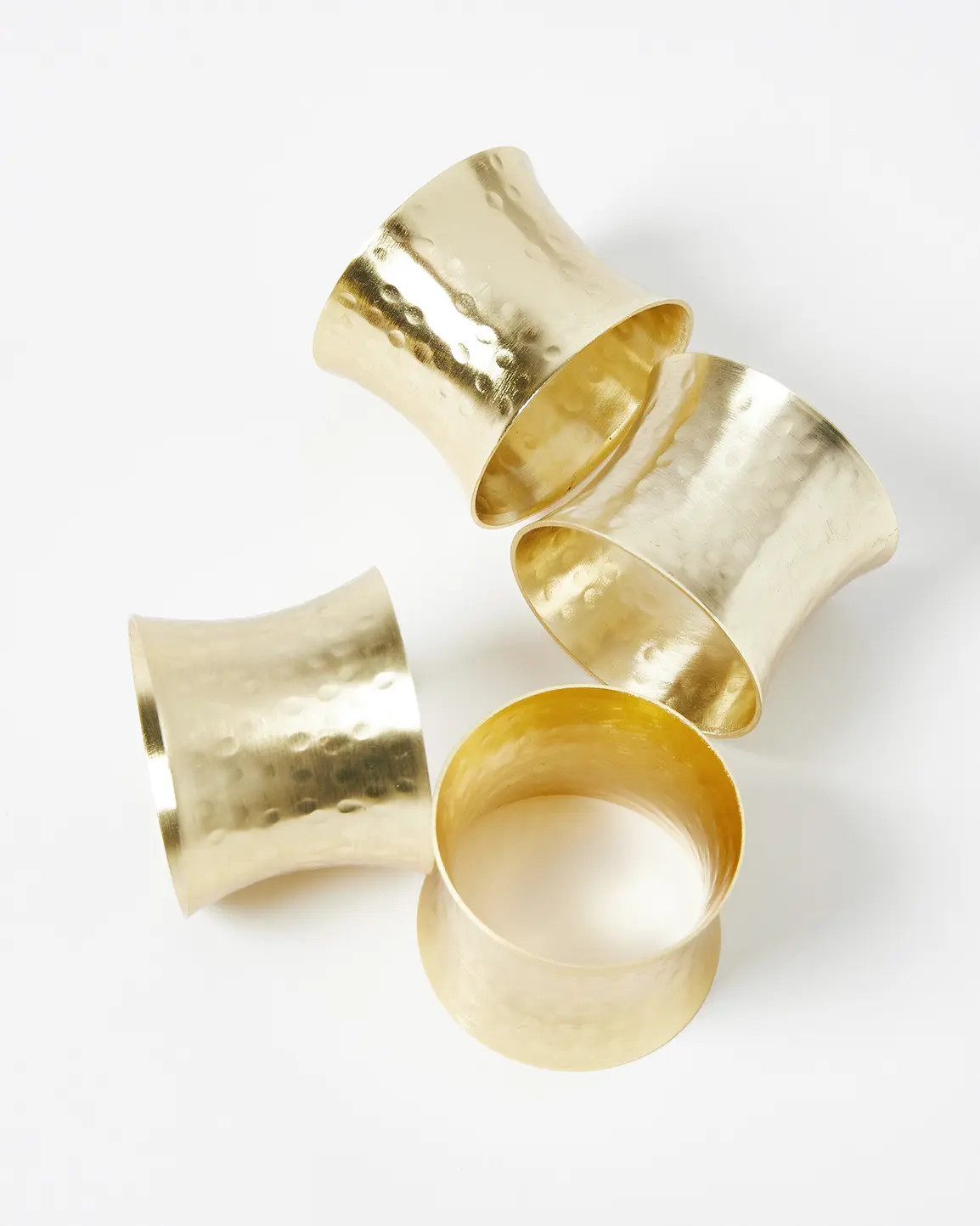 Hammered Gold Metal Napkin Rings Set of Four | Oliver Bonas | Oliver Bonas (Global)