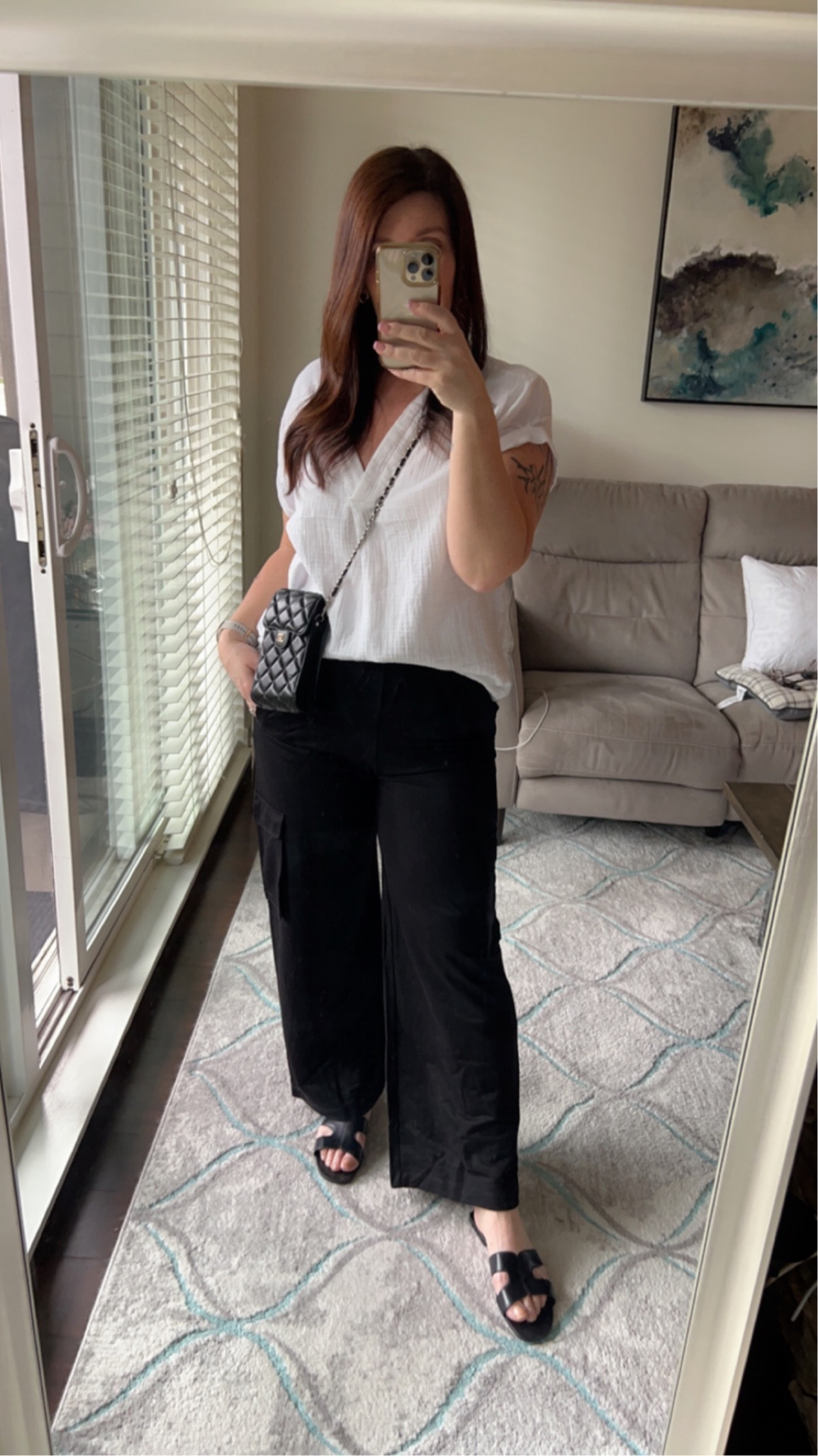 Ootd. The cargo pants from H&M are very comfy and also very high waisted, they are an ankle length on me, I’m in a size small and I’m 5’6”. The top is also super comfy, i sized up to a medium for a bit of an slouchy fit. I also linked a less expensive version of my phone purse  

#LTKfit #LTKFind #LTKshoecrush