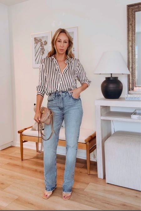 Striped button down looks like sezane straight leg jeans denim and top outfit for dinner girls night spring outfit with jeans 

#LTKfindsunder50 #LTKstyletip #LTKover40