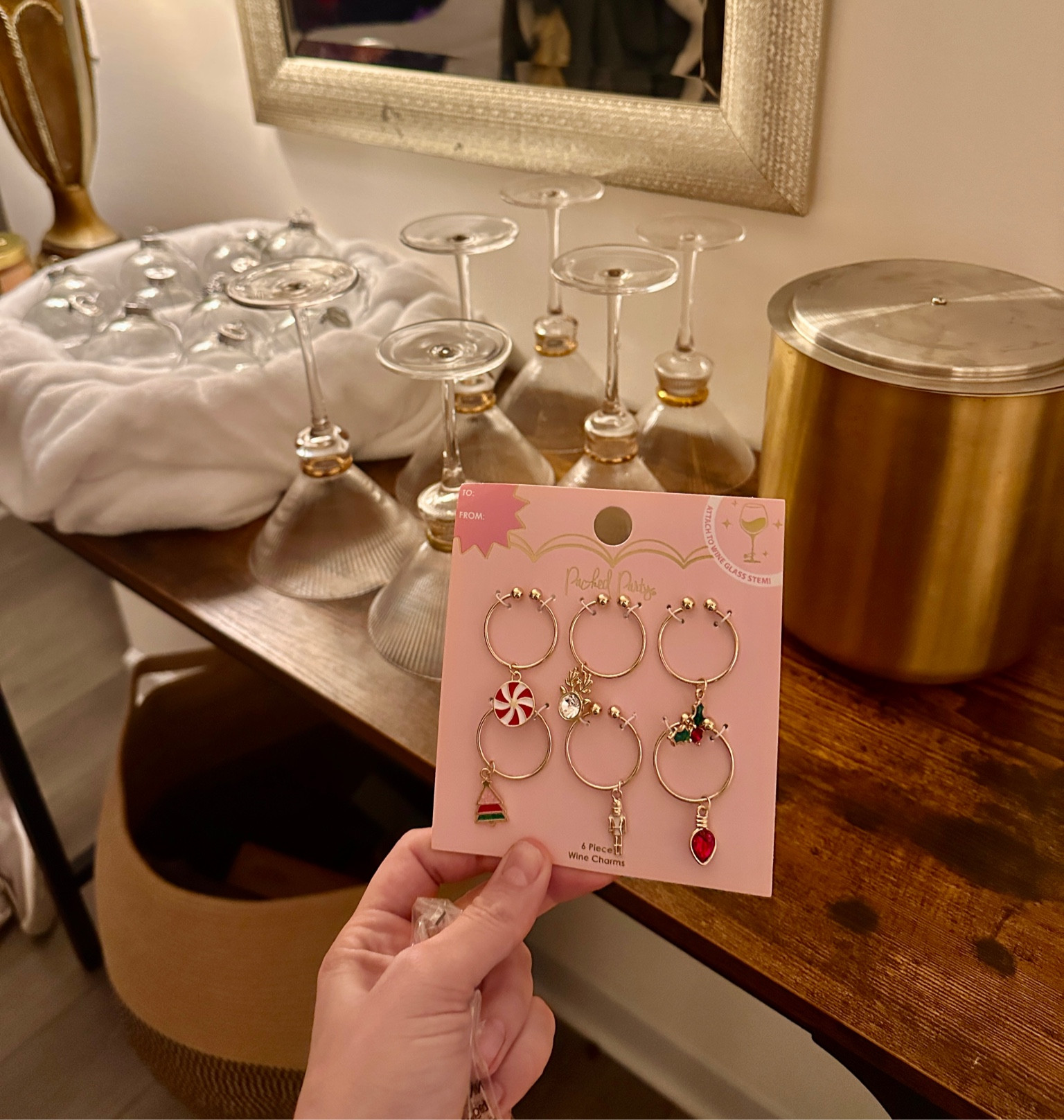 Christmas Eve cocktail bar station for martinis. These are glass bulbs I’ll fill with the drink the guests can grab and pour into martini glass. Charms are adorable from Walmart - they sent me the wrong ones I ordered so linking  both. Glasses and ice bucket are from Aldi so linking similar!

#LTKSeasonal #LTKHoliday