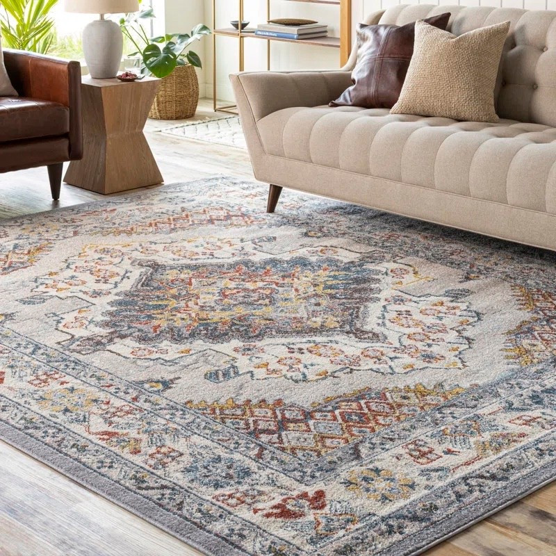 This oriental indoor rug from Wayfair adds the prettiest vintage inspired touch to any living room. I love the soft neutral base with hints of blue, rust, and gold that warm up the space without overpowering it. It pairs perfectly with a tufted sofa, leather accent chair, wood side table, and layered throw pillows for a cozy, collected look.

#LTKSaleAlert #LTKHome