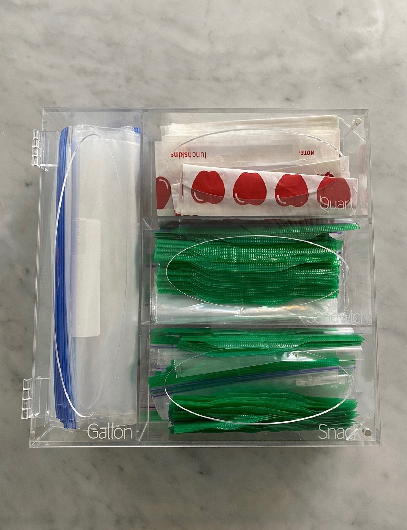 I've been searching for an acrylic bag organizer and finally found this- we LOVE it! Saves a ton of space & lets me know at a glance when we are running low on a particular size  

#LTKFind #LTKhome #LTKunder50