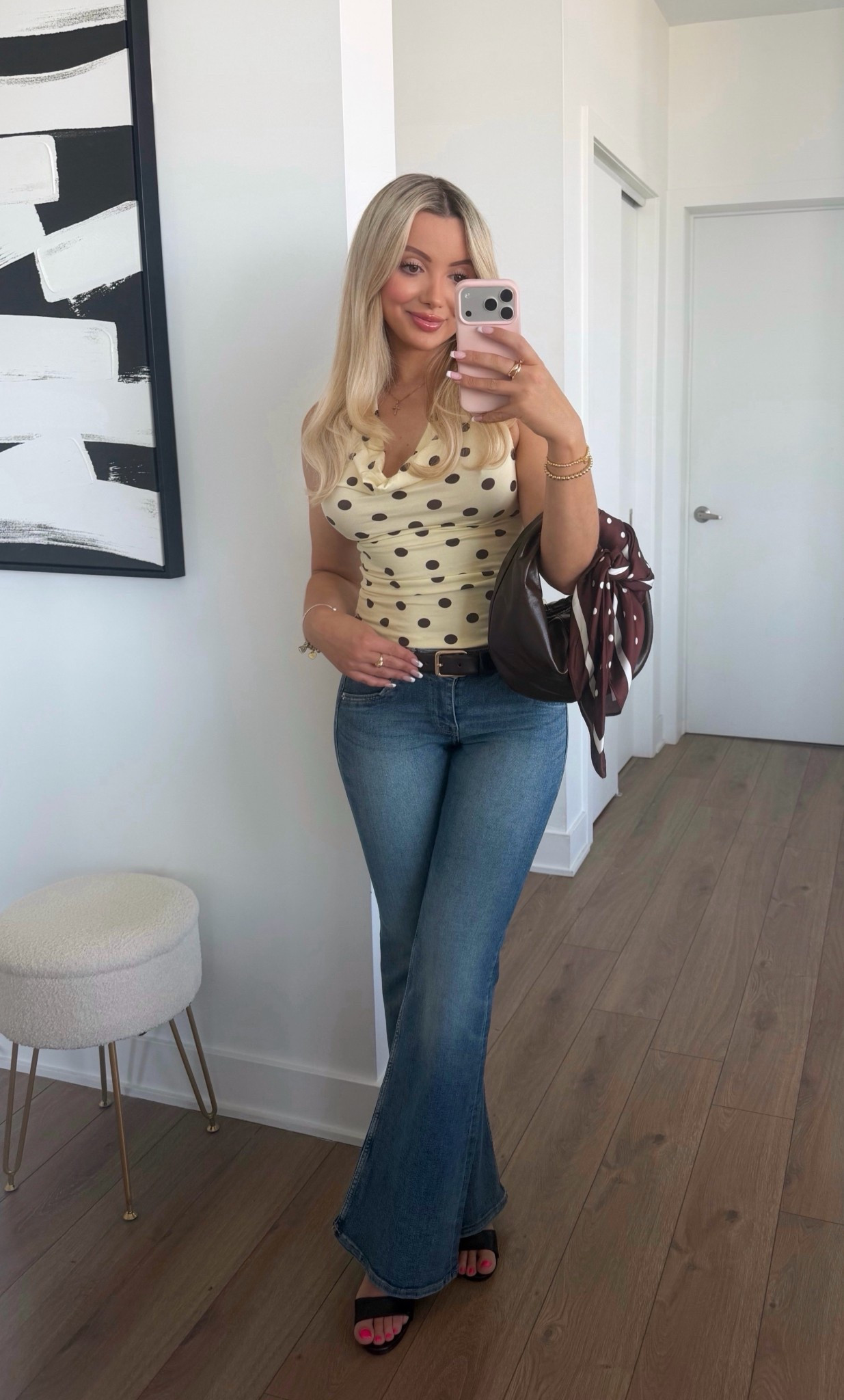 Polka dot halter top and flared jeans outfit for spring/ summer 

#LTKootd #LTKSaleAlert #LTKFestival