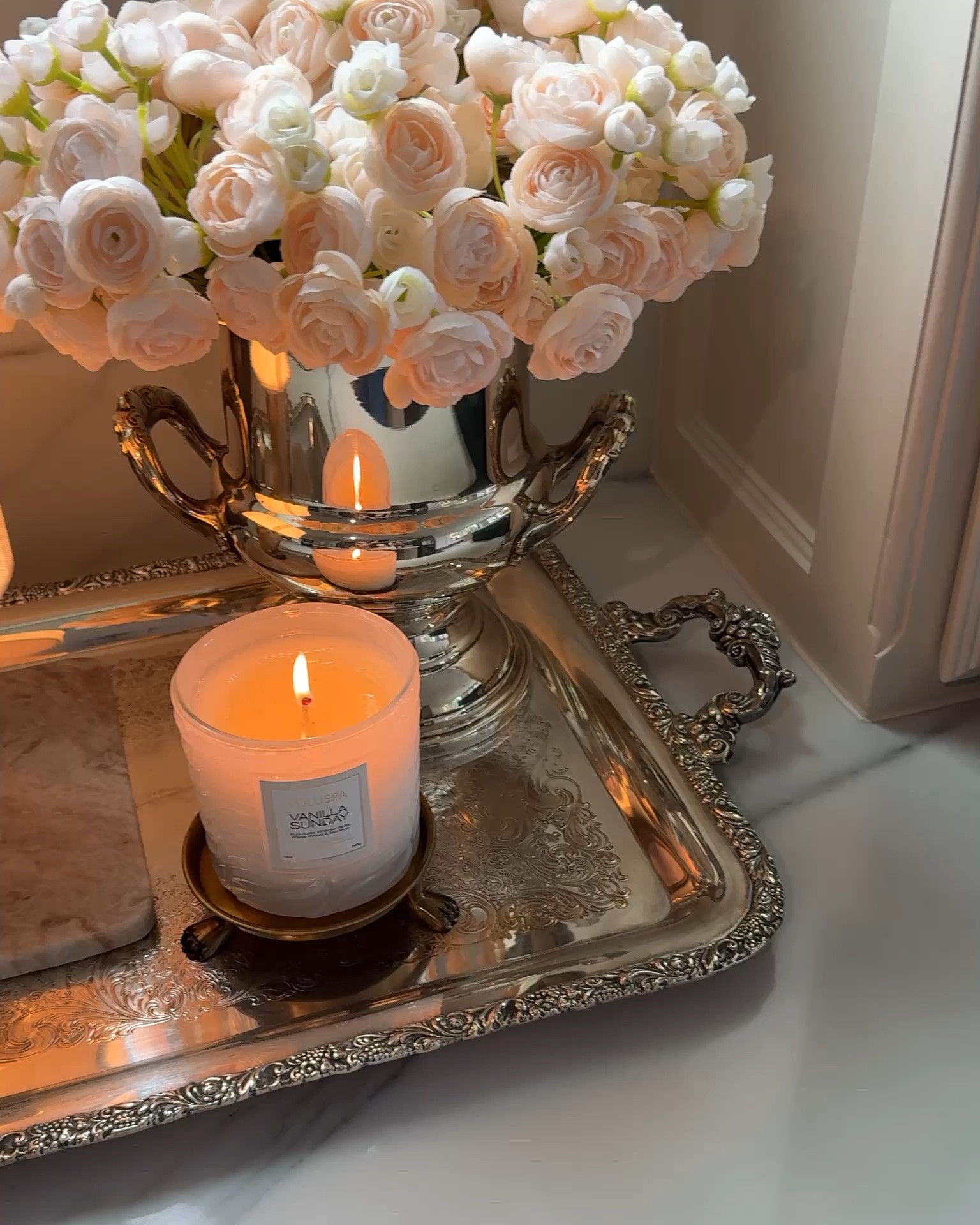One of my favorite styling tricks: a vintage-inspired silver tray, fresh flowers in a champagne bucket, and the prettiest clawfoot candle glowing in the background. ✨

These are the little details that make a home feel layered, collected, and inviting. If you love timeless home décor, vintage-inspired styling, cozy luxury, and elevated everyday spaces, I linked everything for you—including this gorgeous Amazon silver tray.

Classic pieces, beautiful textures, and a warm candle glow never go out of style.

#LTKHome
