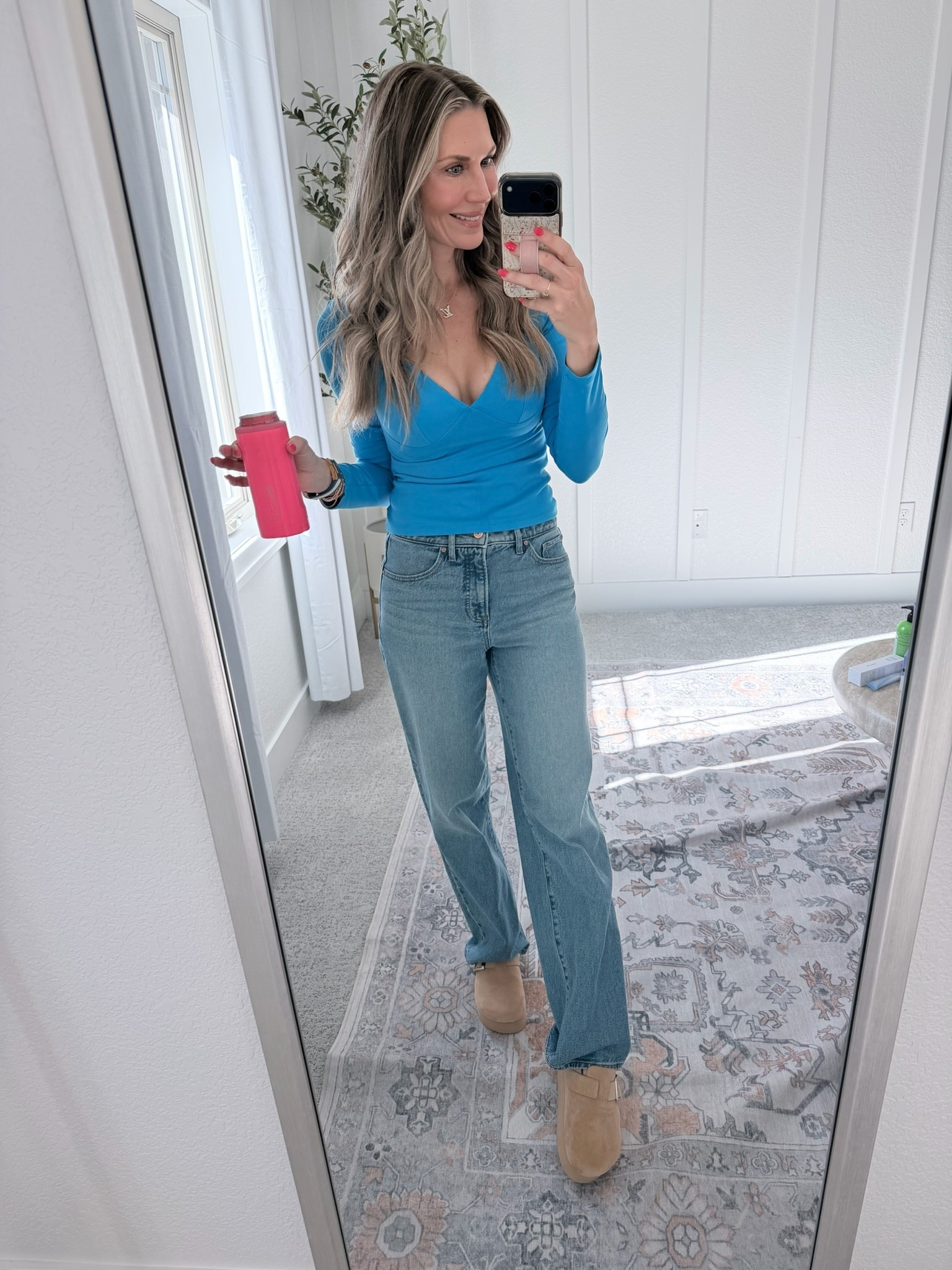 Bright blues + classic denim is always a yes 💙

Wearing a fitted blue long sleeve wrap top paired with high rise straight leg jeans and neutral tan platform clogs  for an easy everyday outfit that feels put together but still comfortable.