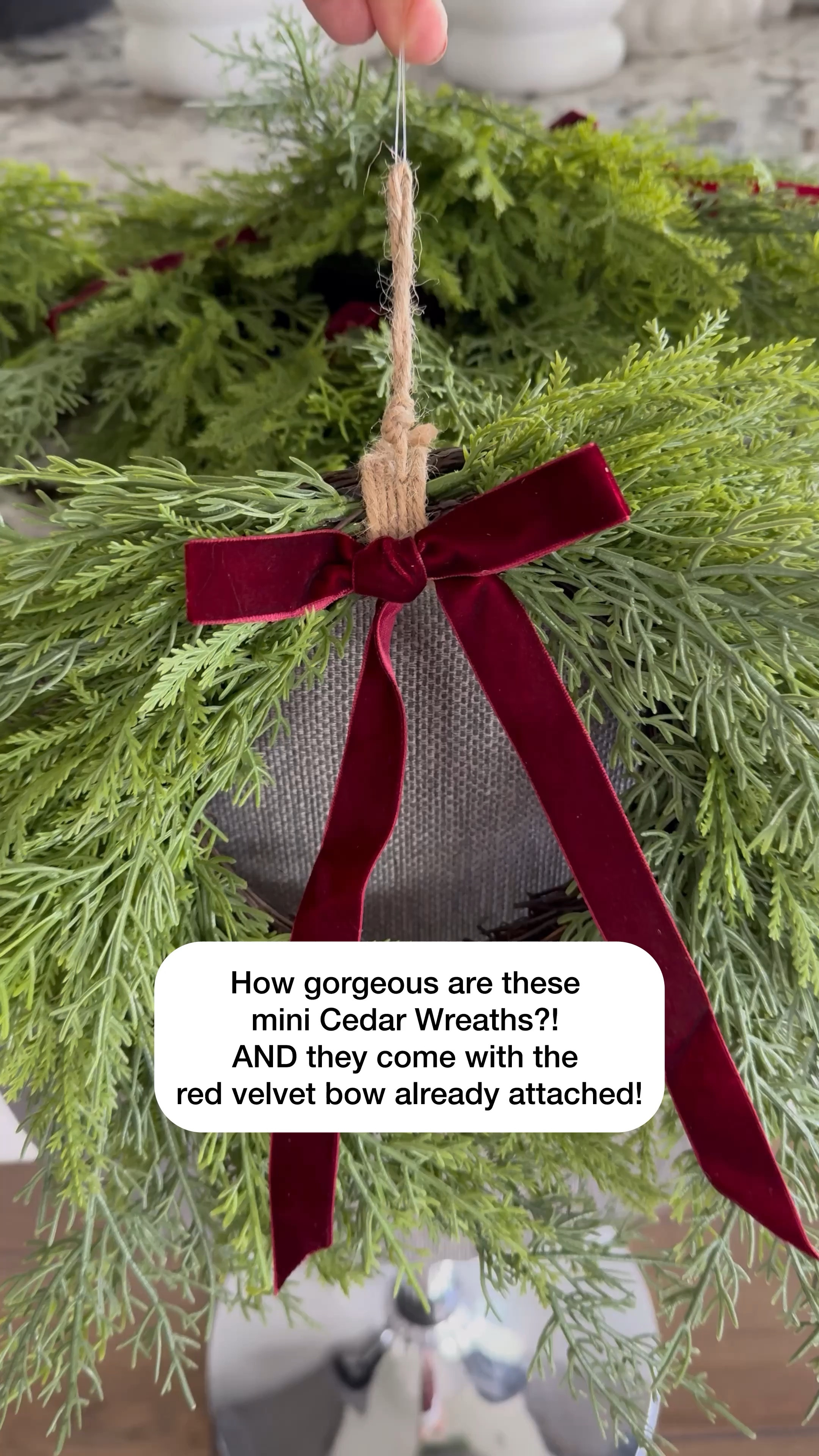 How gorgeous are these mini cedar Christmas wreaths? AND they come with the red velvet bow already attached! The best part…🥁drum roll pls… only ten bucks!  I ordered five to put on the back of my kitchen counter stools. 
XO Amy, Modern Farmhouse Glam 

#LTKSeasonal #LTKHoliday #LTKHome