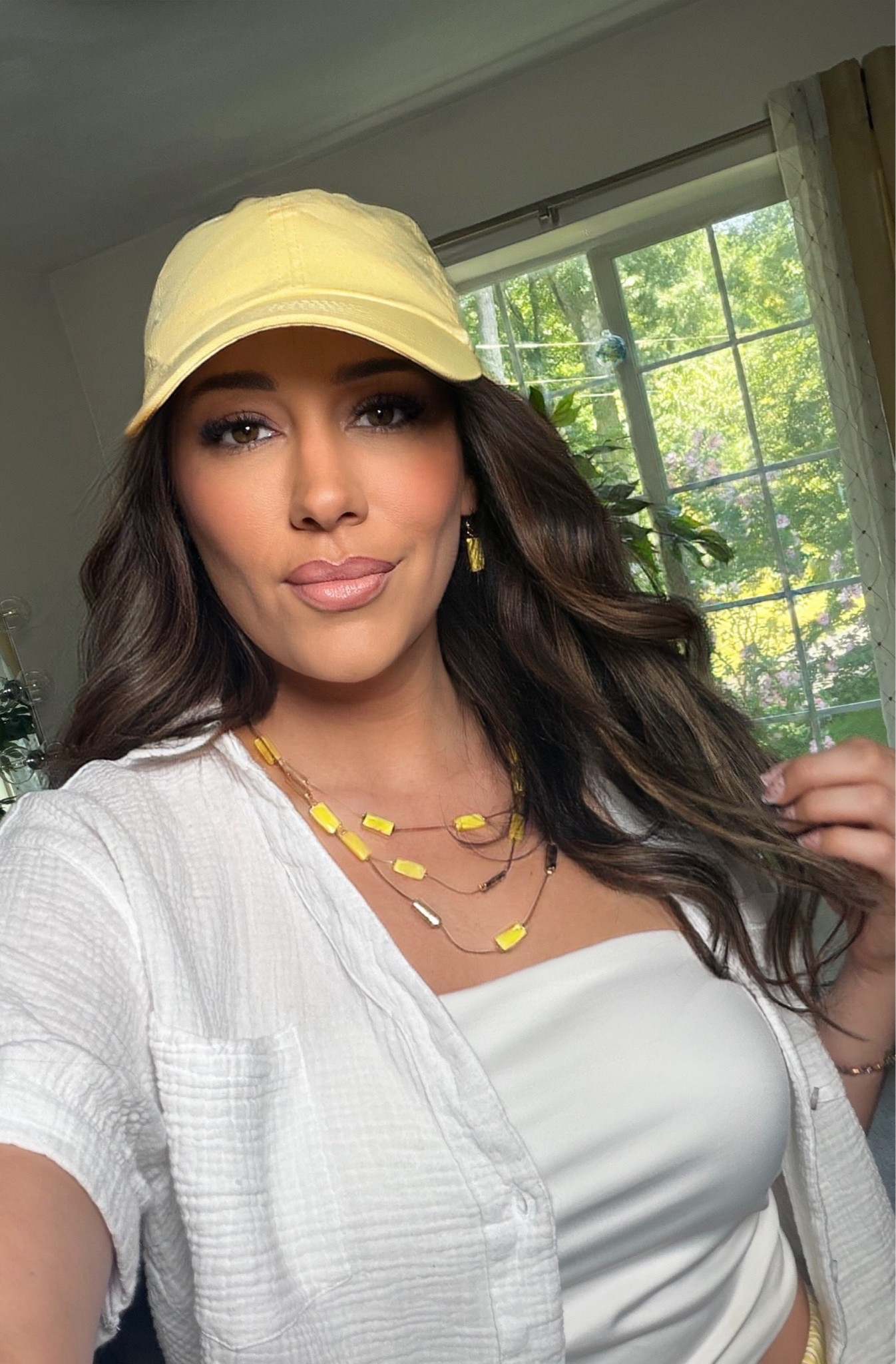 Easy breezy summer uniform! 🍋 

Swapped my usual denim for these airy striped wide-leg pants and I might never go back. Threw on a baseball cap and layered necklaces to complete the look.