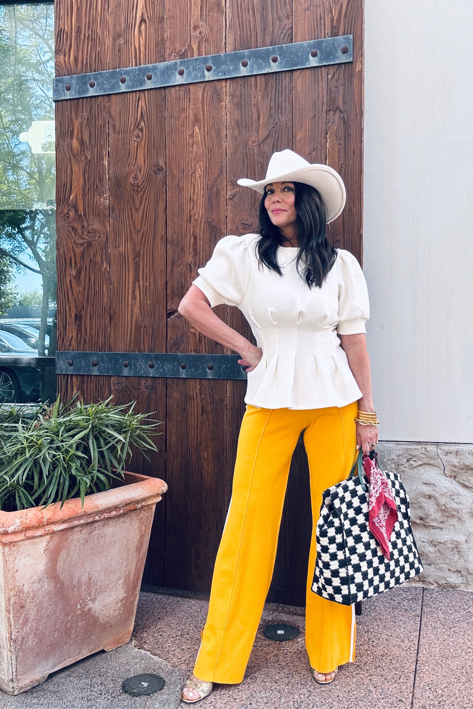 Super long flattering track knit pants in sunflower yellow with a  dressier fleece top with cinches waist. Cute outfit for so many occasions or wear to work 
Wearing medium in both pant and top. 

#LTKItBag #LTKParties #LTKSpringSale