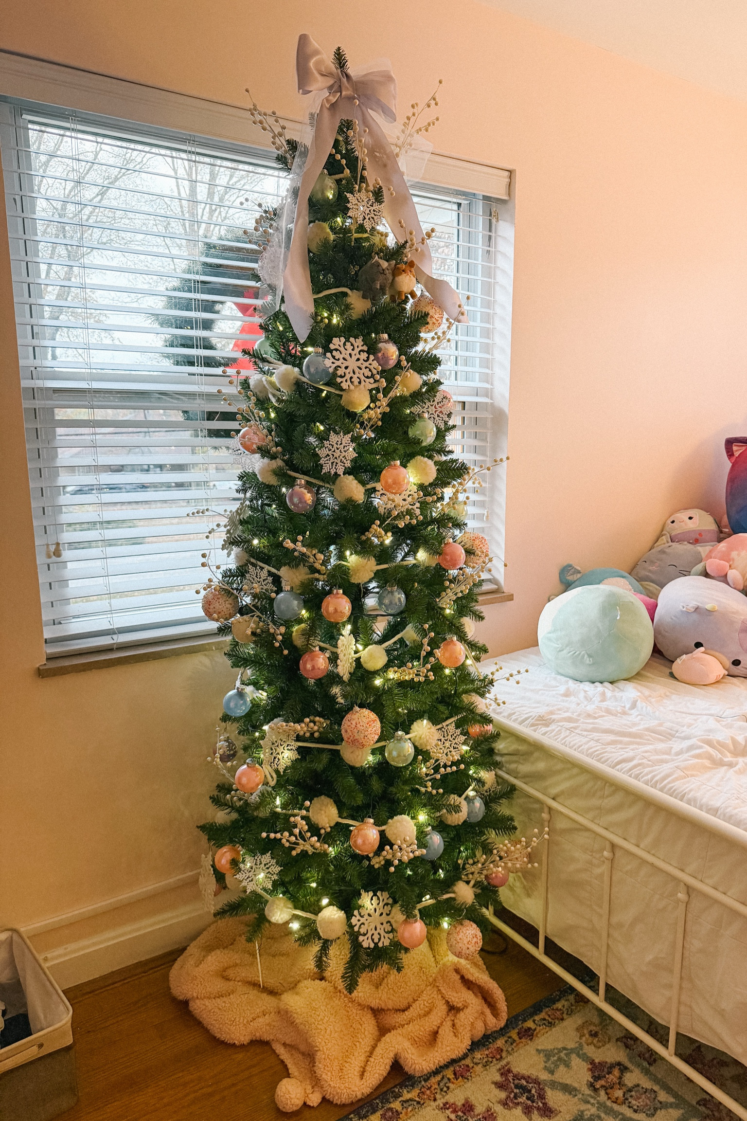 Eliot wanted a very girly tree and these slim 7.5 trees from Home Depot are perfect because they can fit in tight spaces but are still full sized trees! We decorated it with all pastel colored ornaments and used a large satin bow for a tree topper 🎄

#LTKSeasonal #LTKKids #LTKHoliday