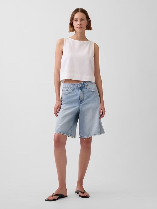This white linen crop top from Gap is the definition of effortless summer dressing.

Made from a soft, heavyweight linen blend, it has that structured-but-breathable feel that instantly elevates any outfit. The ultra-cropped length and clean boatneck silhouette keep it modern, while the back button detail adds just enough interest.

Perfect for pairing with high-waisted trousers, denim, or linen skirts, this is one of those pieces you’ll wear on repeat all season.

If you’re building a minimalist wardrobe, capsule closet, or looking for easy summer outfits that still feel polished, this is a staple.

#LTKTravel #LTKgrwm #LTKdayinmylife