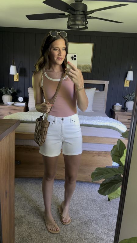 Casual summer outfit idea. The tank has a built in bra which is such a game changer! It runs a little small so size up. 

Tank - small
Shorts - size 26 


#LTKFindsUnder50 #LTKStyleTip