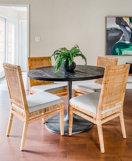 This black dining table with a metal pedestal base can work with several different styles - we paired it with rattan chairs to bring in some texture!
.
.
.
Black Wooden Dining Table 
Black Metal Dining Table 
Rattan Dining Chairs 
White Upholstered Dining Chairs
Eclectic Design 
Industrial 
Modern 
Transitional 

#LTKbeauty #LTKhome #LTKstyletip
