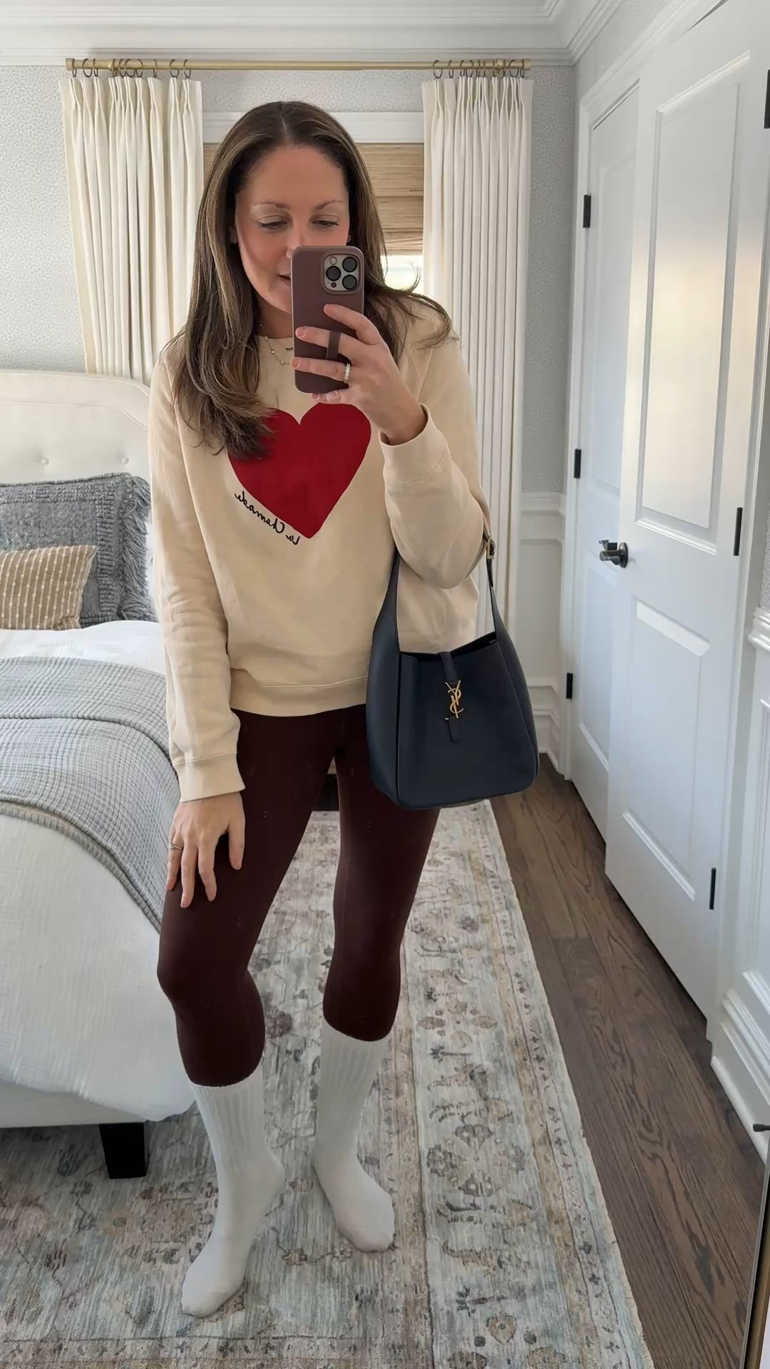 Valentine’s Day OOTD! Cute heart sweatshirt, leggings, cozy socks and my newest bag from @Vivrelle  (use my code MICHELLEPULMAN to try Vivrelle an get your first month free!) 

#LTKSaleAlert #LTKootd #LTKValentine