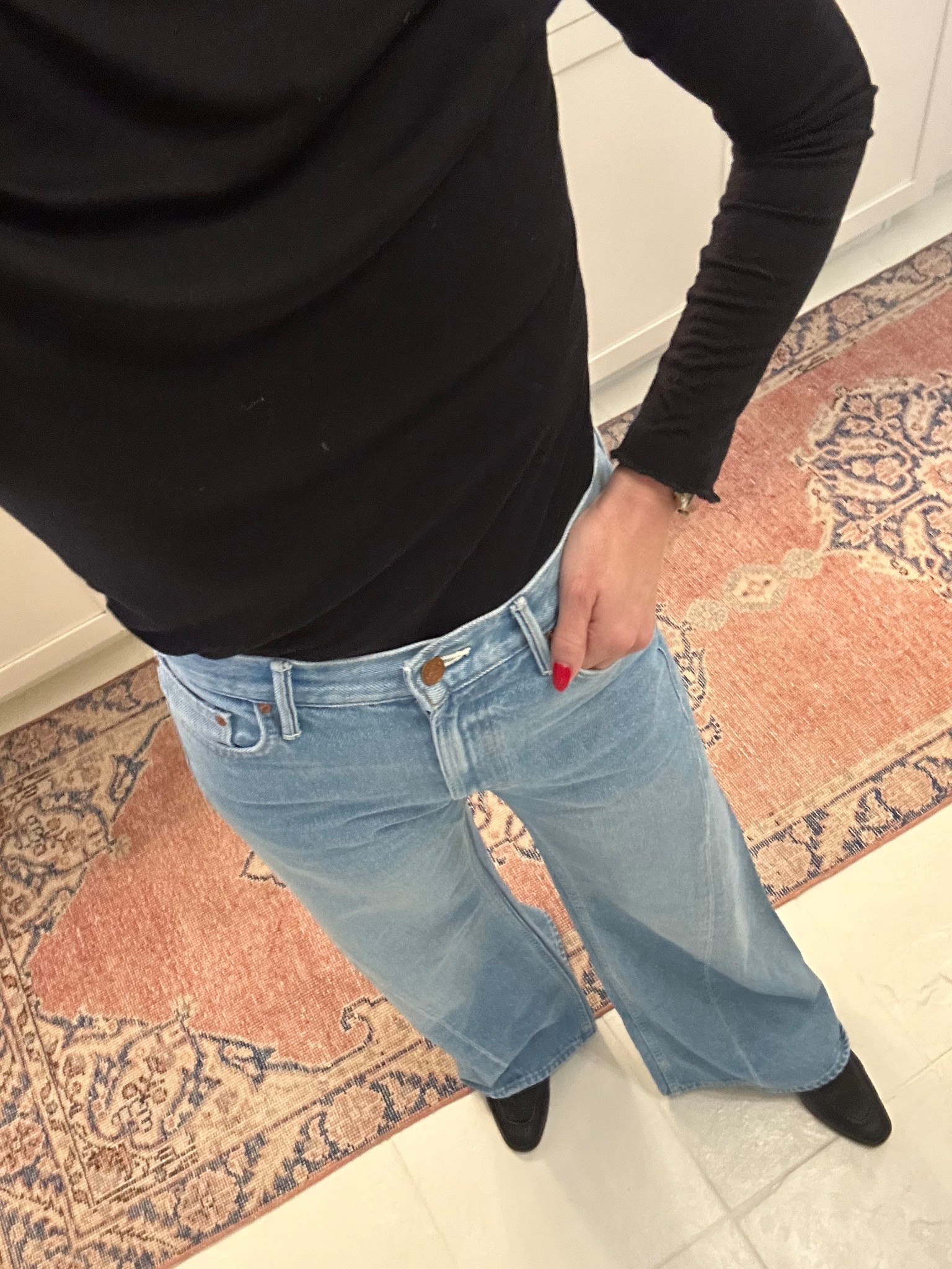 Classic look with black turtleneck and wide leg jeans. This color is perfect for spring and I love the fit. Can never go wrong with mother jeans!

#LTKPetite #LTKOver40 #LTKmomlife