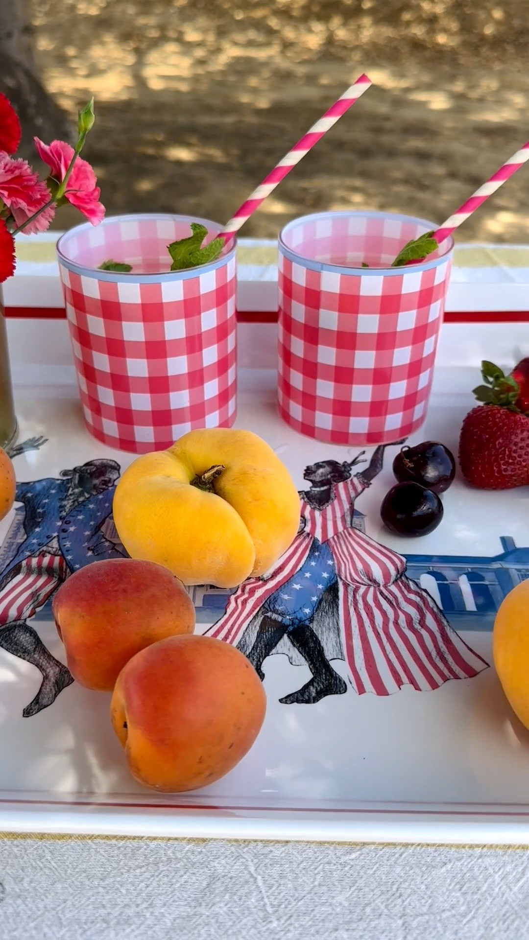 Celebrating the Fourth with a tablescape that's festive without feeling overdone. 🇺🇸 I love how the Sheila Bridges for Walmart Philadelphia Collection, created in honor of America's 250th anniversary, brings heritage-inspired artwork to the table. Paired with fresh florals, summer fruit, and classic gingham, it feels relaxed, timeless, and perfect for gathering outdoors.

Fourth of July sales are still going strong—shop all my entertaining favorites on my LTK!

#LTKHome #FourthOfJuly #Tablescape #OutdoorEntertaining #WalmartHome #SheilaBridges #PhiladelphiaCollection #ServingTray #SummerHosting #TableDecor

#LTKdayinmylife #LTKvlog #LTKHome