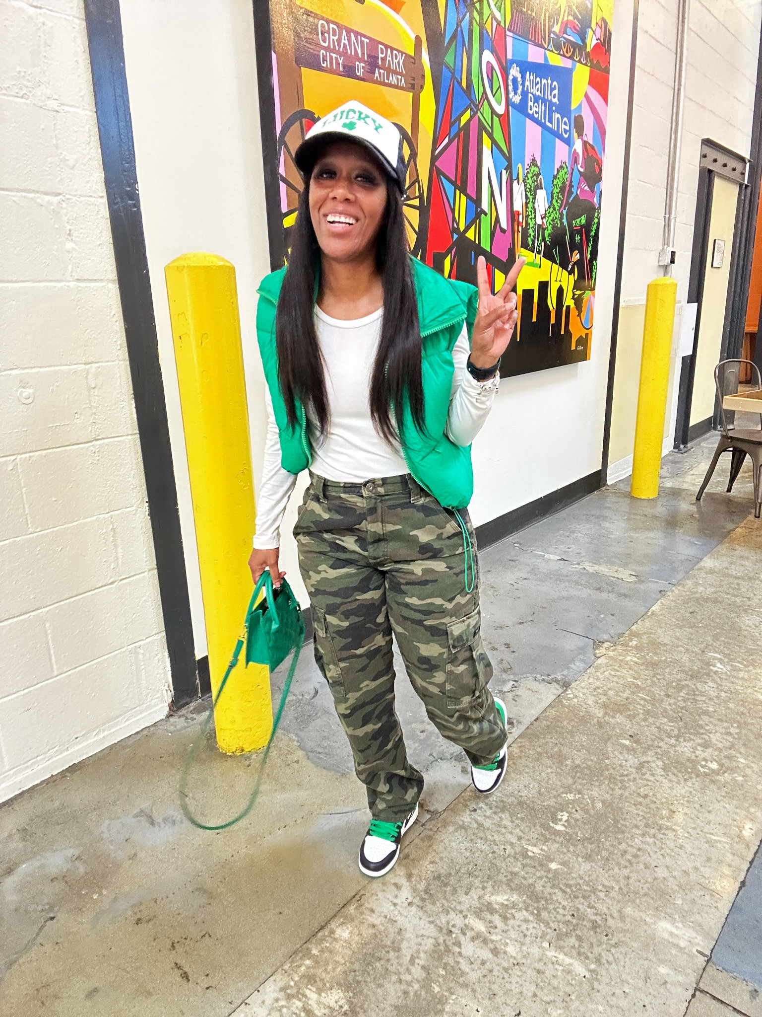 Camo outfit ideas! 

Camo cargo pants, white long sleeve shirt, and green puffer vest.

Styled with a green mini crossbody bag, trucker hat, and Jordan 1 lucky green sneakers.

#LTKShoeCrush #LTKBacktoSchool #LTKFindsUnder100