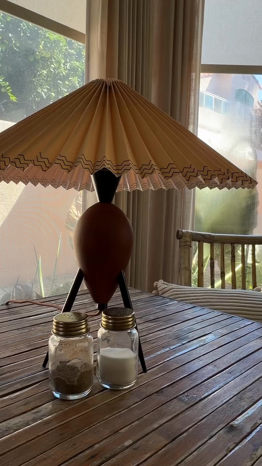 Designer-inspired lighting without the designer price tag ✨ This Zen table lamp features a natural solid wood tripod base paired with a beautiful pleated umbrella shade for the perfect mix of warmth and style. 🤎

Lightweight, portable, and designed with a stable, durable base, it’s an easy way to add a soft, elevated touch to any room. And it comes with two lamp shades for added versatility!

#LTKHome #HomeDecor #TableLamp #AmbientLighting #HomeLighting #NeutralHome #DesignerHome #AffordableHomeDecor #ZenHome #LivingRoomDecor #BedroomDecor #HomeInspo