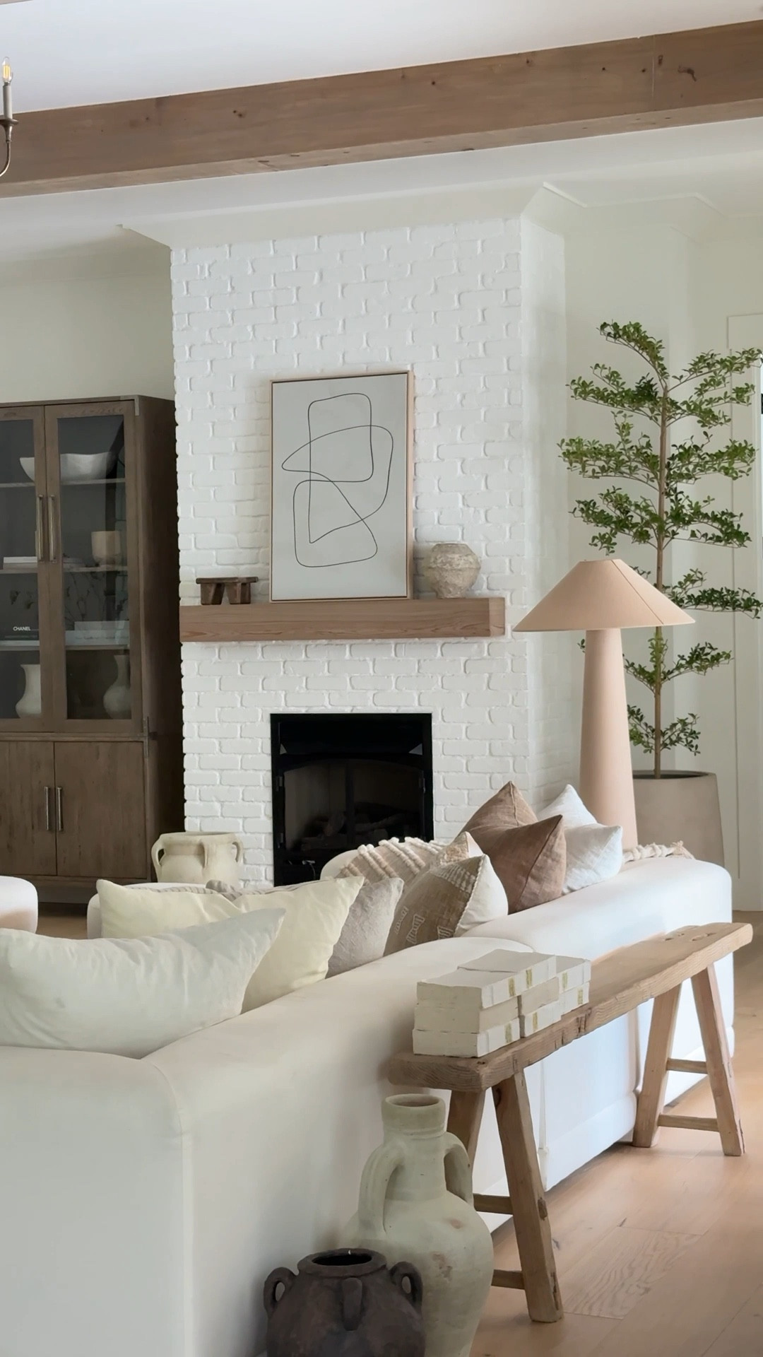 Mantel decor and a cozy living room! 

#LTKHome #LTKFindsUnder100 #LTKStyleTip