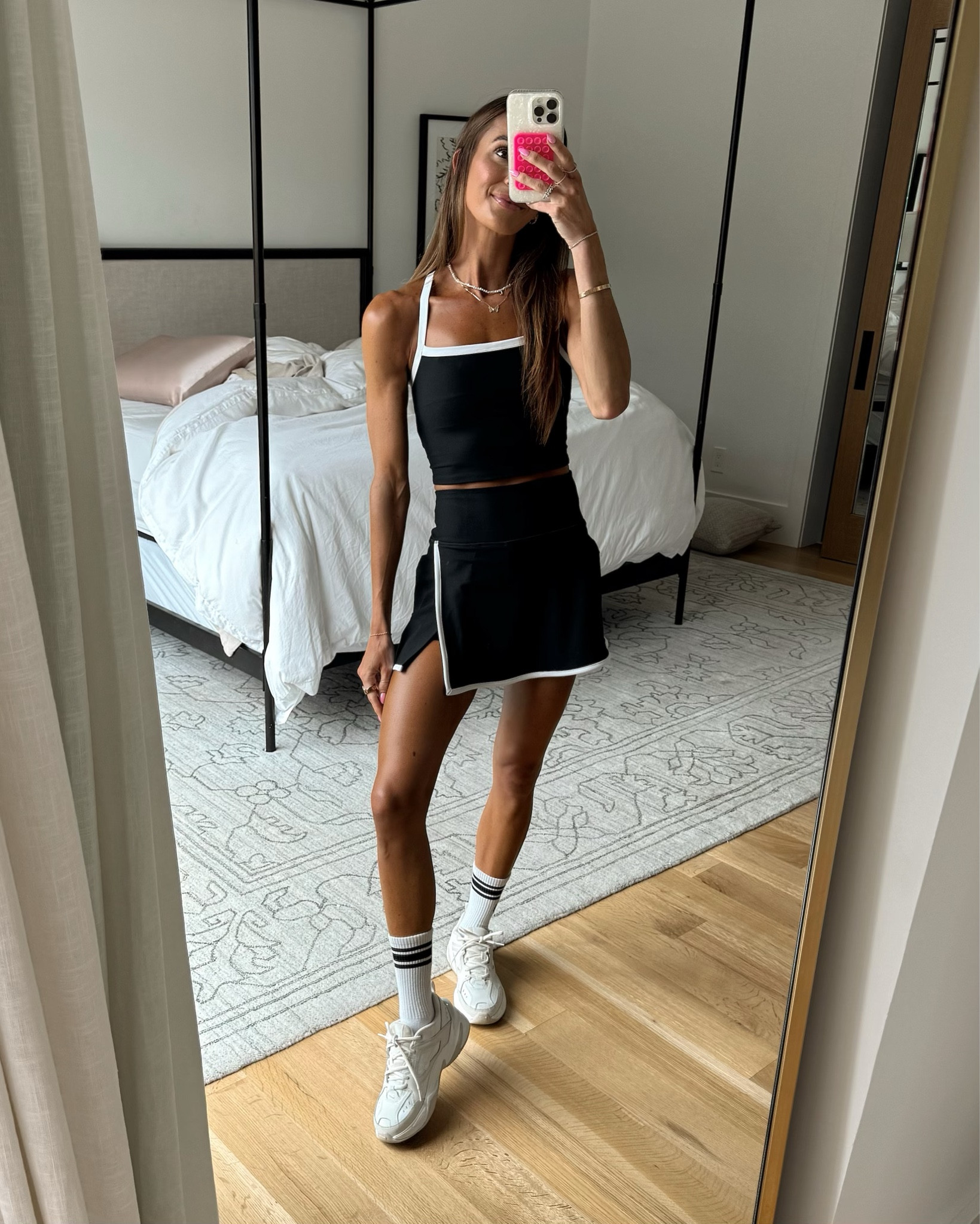 top + skort 25% off today! 🙌🏻 so comfy + functional! 🖤 both run tts, wearing xs in tank + skort 

#LTKFitness #LTKSaleAlert