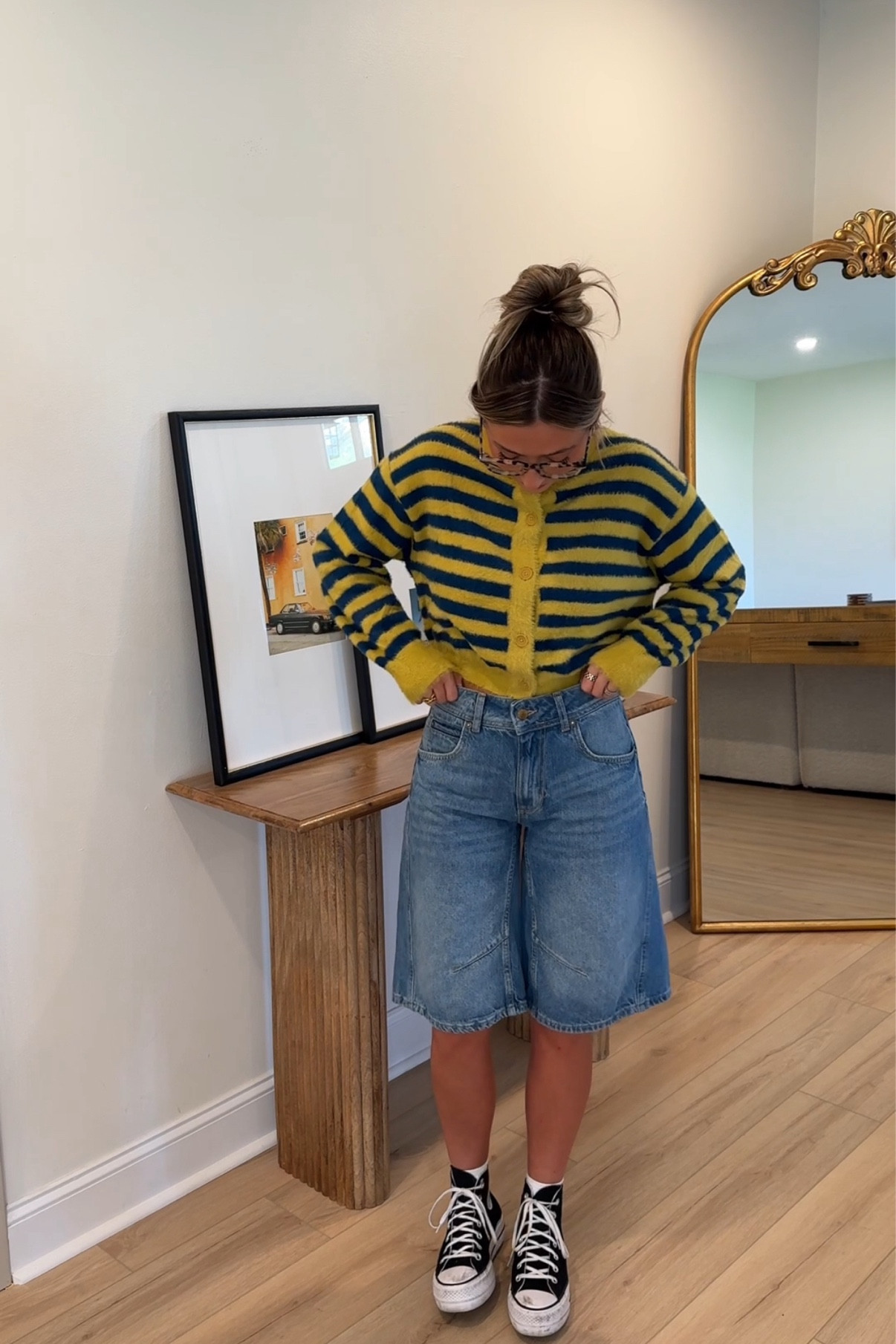 I sized up to a medium in the striped cardigan. It is SO soft! I’m wearing size 24 which is true to size for me in the shorts  

#LTKstyletip #LTKfindsunder100 #LTKfindsunder50