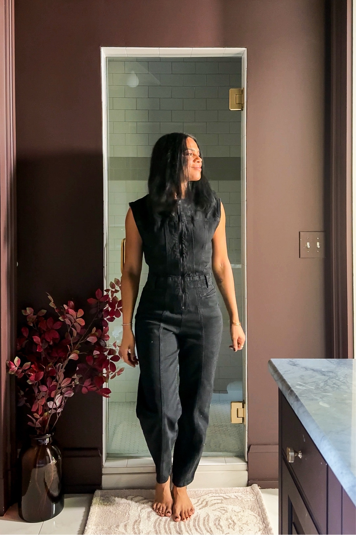 Cutest target jumpsuit is true to size and has adjustable tabs at the waist. I’m 5’4” :)