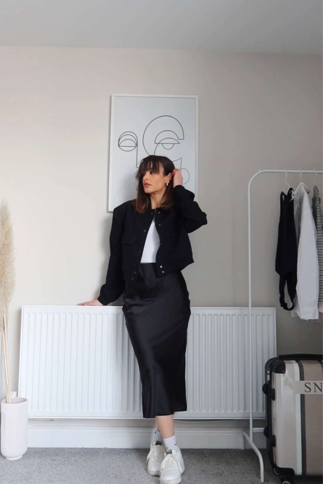 Black bomber jacket, white top, silk satin maxi skirt, white trainers 

#LTKstyletip #LTKeurope #LTKSeasonal