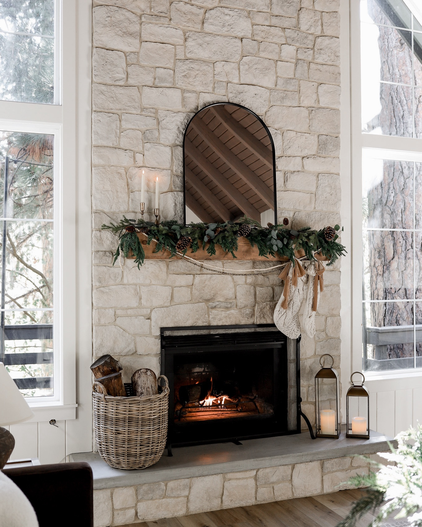 Shop the Christmas fireplace decor at the lake house! I mixed two different garlands here, one of each! 

#LTKHome #LTKSeasonal #LTKHoliday