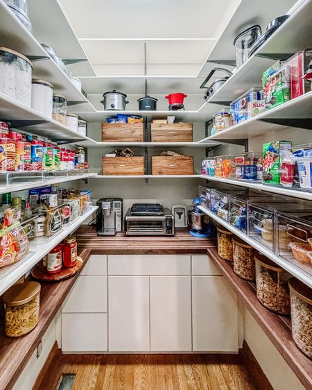 Who needs takeout when your pantry is as organized as this?! Taking a pantry from piles of stuff to designated zones with just the right bins and canisters (love these gold top glass canisters from Neat!) brings us so much joy. And the joyful reaction from our client makes us all so happy