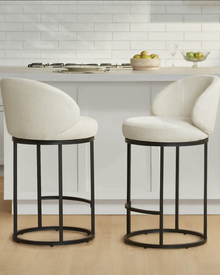 Swivel barstool that comes in 4 different colorways. $130 each. I fell in love with a version of this that was $750 per stool. Did a ton of searching to find a better price for comparable and these are the winner, instant hit in our new home!