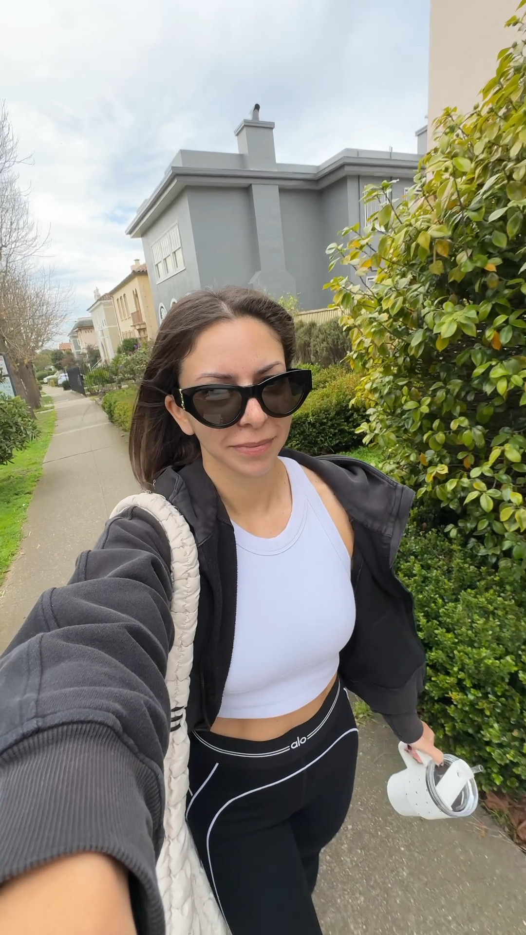 Alo workout outfit. This is one of my favorite tops! Have it in 3 colors and I like to pair it with joggers for a cute athleisure outfit  

Alo bra top- medium
Alo leggings- small
Lululemon hoodie- xs/s
YSL sunglasses
Target puffer tote bag
New balance 9060 sneakers
Tavi grip socks 

Petite, Pilates outfit, barre outfit, active wear, workout outfit, athleisure 

#LTKfitnessgoals #LTKPetite #LTKActive