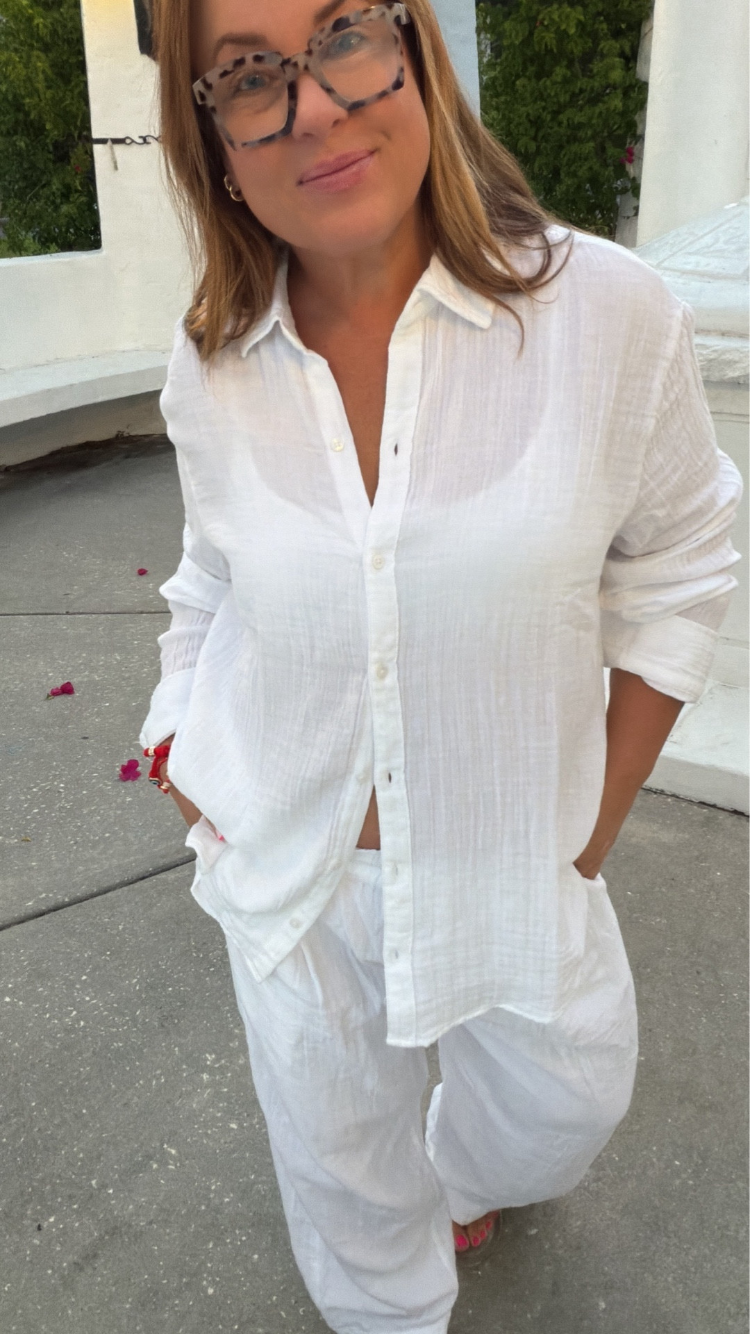 If you’re a woman in her 40s or 50s or 60s or more and comfort is really your #1 priority, but you also want to look put together and cute and stylish… You have found your corner of the Internet!

This 2 piece gauze set is perfect for summertime and will make you feel like you’re on a Mediterranean vacation! 

Im wearing both the top of the pants in a size large, the cute little evil eye red bracelets are such a cute touch, and these clear jelly flip-flops will likely be my slide of the summer ❤️