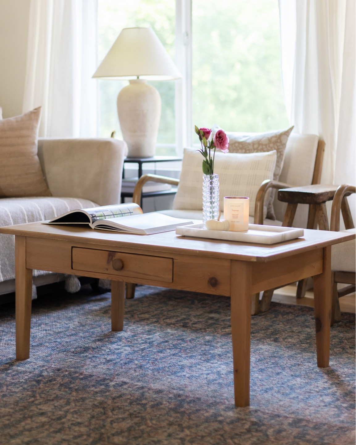 Simple fall living room decor, coffee table decor, throw pillows, candle, vintage vase, gray stripe throw blanket

Coffee table and lamp are thrifted/DIY, curtains are Ikea 

#LTKstyletip #LTKSeasonal #LTKhome