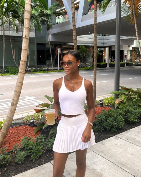 White tennis skirt, Alo, white tank top, shopping in Miami, athleisure, daytime outfit 

#LTKfitness #LTKSeasonal