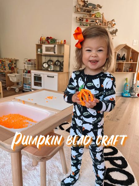 Pumpkin craft. Bead craft. Orange beads. 