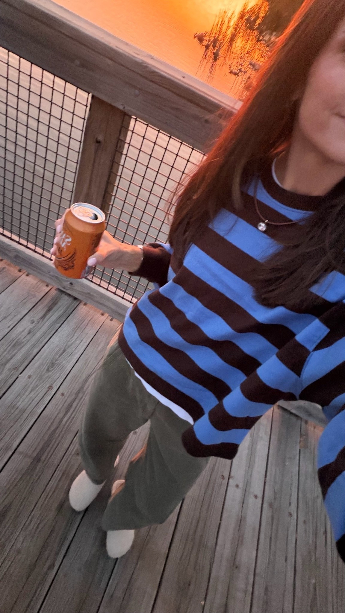 Stripe tee: true size S 
Pants: true size 2
Clogs: size down 1
