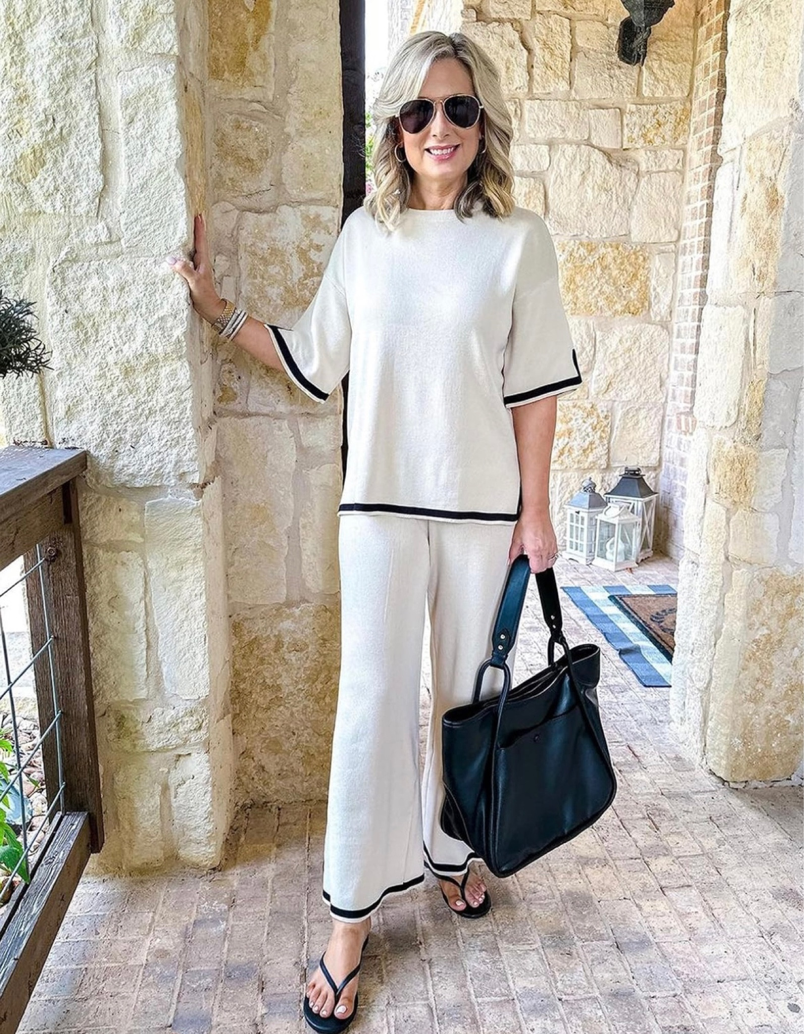 Sweater Sets Women 2 Piece Lounge Sets Short Sleeve Knit Pullover Tops Wide Leg Pants

Black purse 

Black sandals 

#LTKworkwear #LTKstyletip
