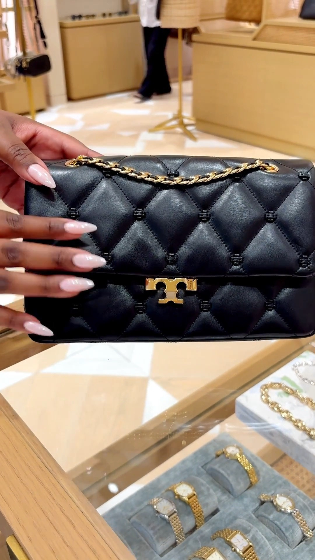 I am in LOVE with the bunny knot shoulder bag by Tory Burch