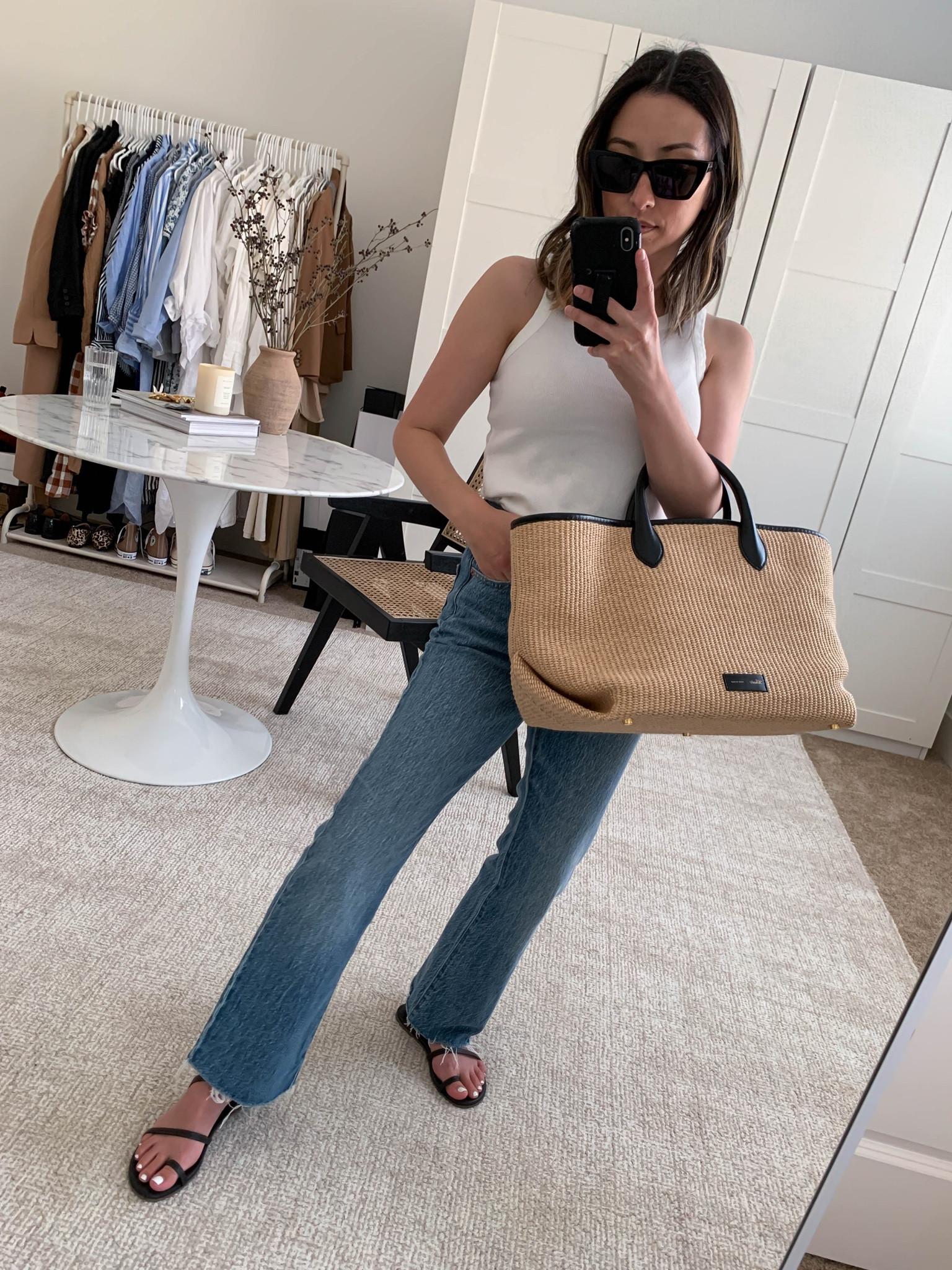 Simple transitional outfits. Petite outfit ideas. 

Tank - Free Assembly small
Jeans - j.Crew petite 0
Sandals - Tkees 5
Tote - Khaite 
Sunglasses - YSL