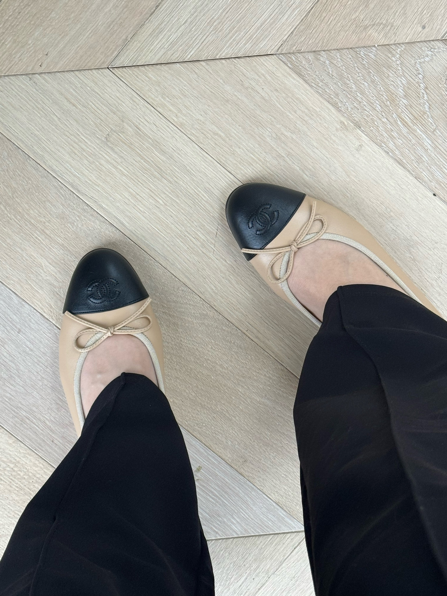 Chanel ballet flats - Chanel shoes - Chanel ballet shoes - ballet pumps - flats - nude shoes - toe cap shoes - top capped pumps - black pumps - little pumps - ballet pumps with bow - ballet shoes with bow - bow ballet shoes - bows - beige shoes - beige pumps - designer shoes - black trousers - H&M new in - H&M trousers 

#LTKeurope #LTKshoecrush #LTKstyletip