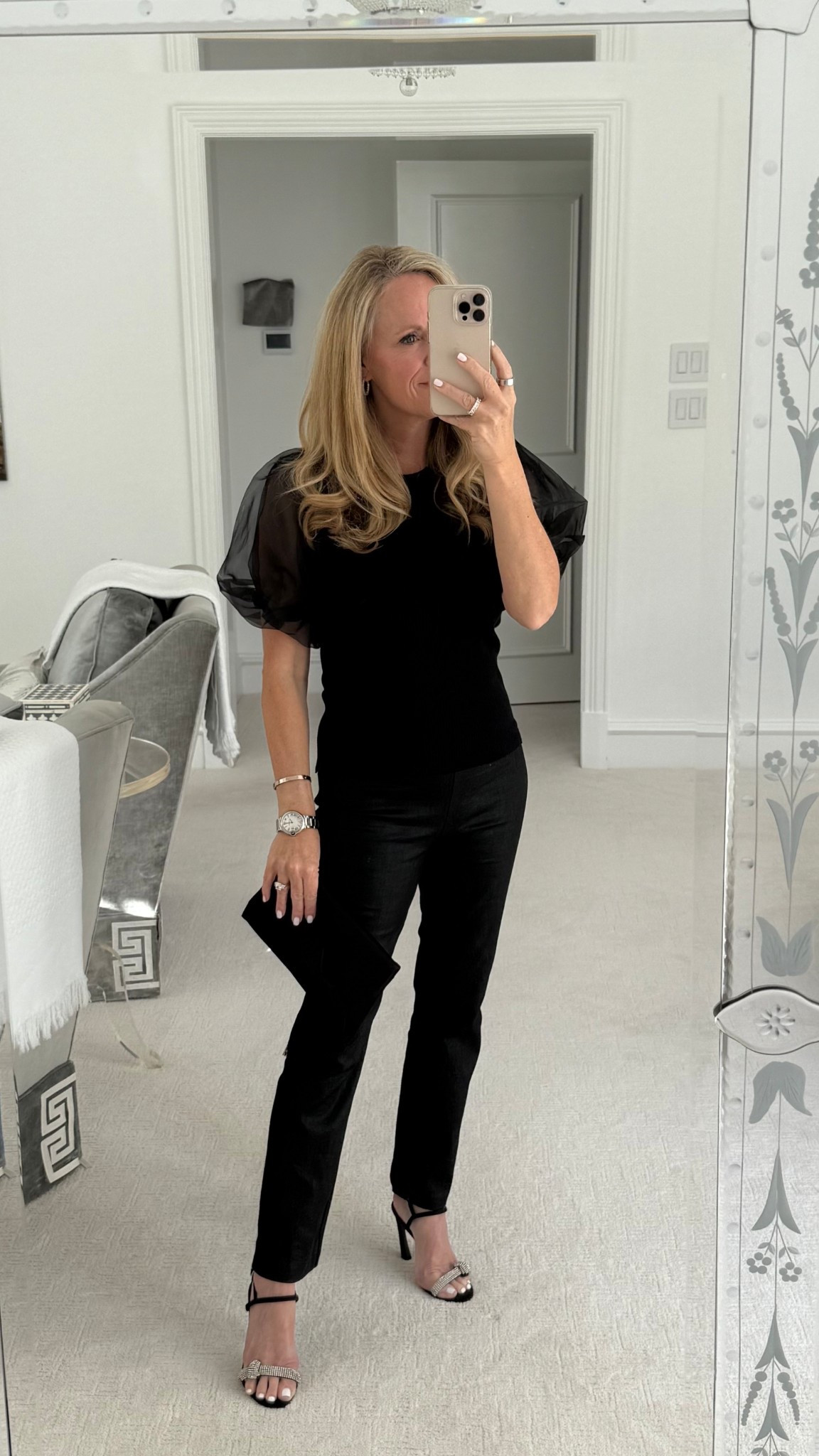 Holiday outfit idea

Brochu Walker Fine ribbed black sweater with organza puff sleeve size XS

Coated denim Ashford pants from Tuckernuck 

Pants are part of the Tuckernuck cyber week sale

Simple sandals and black clutch 