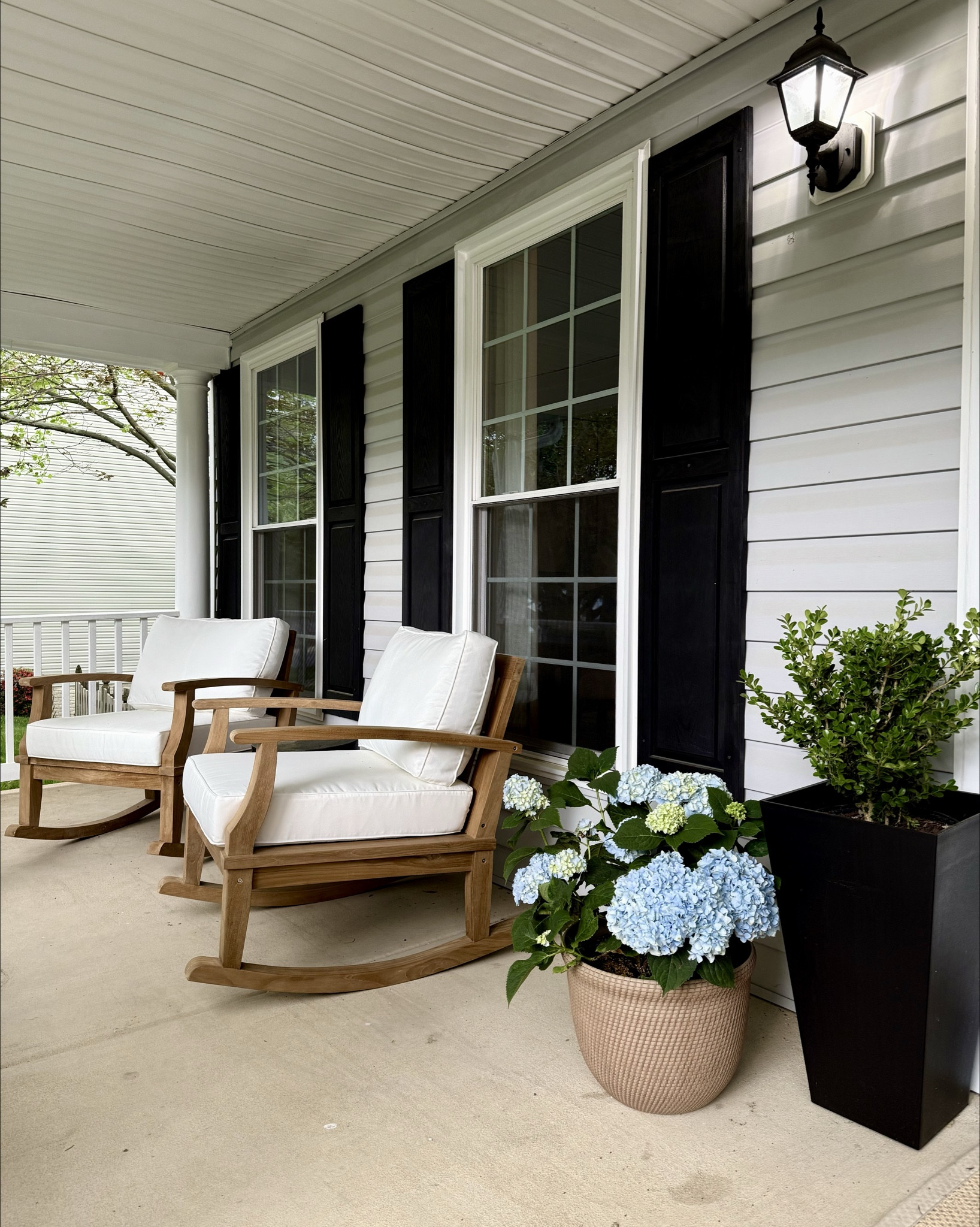 Front porch refresh ✨ new outdoor furniture and plants! 

Obsessing over these teak wood cushioned rocking chairs!!! Quality is SO GOOD 🤩

#LTKHome