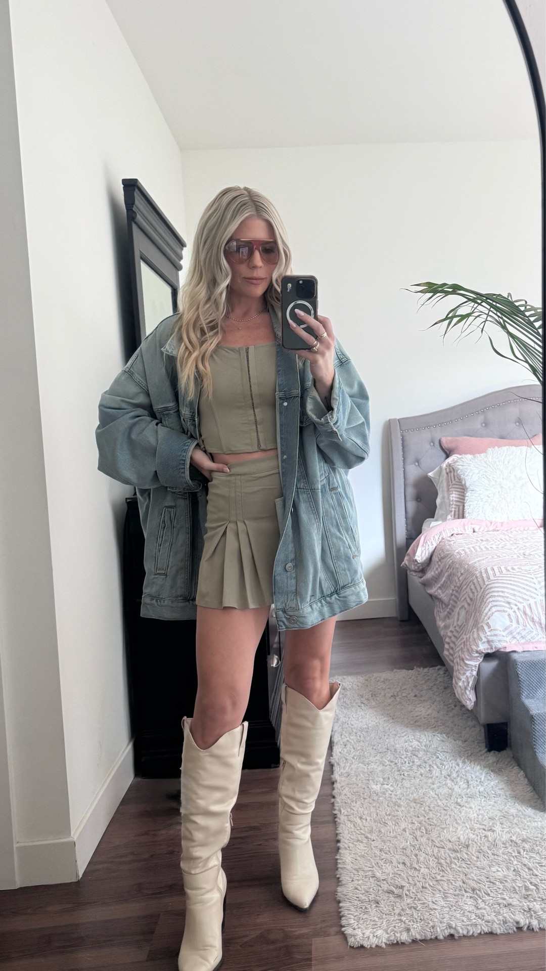 Friday night out. Skirt set and white boots with oversized jean jacket 

#LTKootd