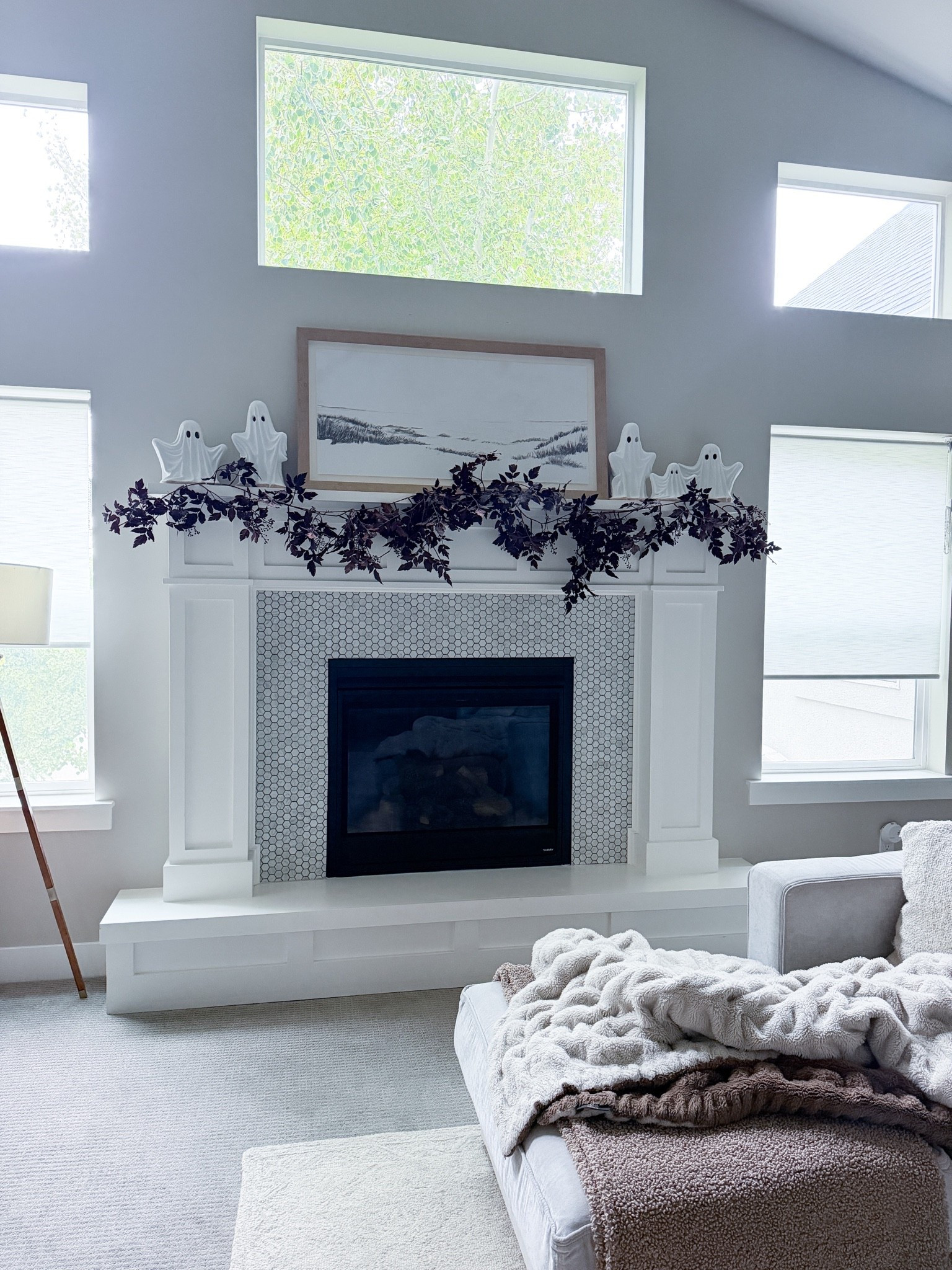 Keeping Halloween simple this year with timeless pieces & thoughtful details. Pottery Barn terracotta ghosts, Cimicifuga garland, & neutral art. A subtle nod to the season without compromising our everyday aesthetic.

Halloween mantel decor - neutral Halloween decor - elevated Halloween decorating - Pottery Barn ghosts - Afloral fall garland - McGee & Co. artwork - minimalist Halloween decor - timeless fall decor - understated Halloween decor - Halloween fireplace styling - designer inspired home decor - classic seasonal decorating - neutral fall home decor - sophisticated Halloween decor