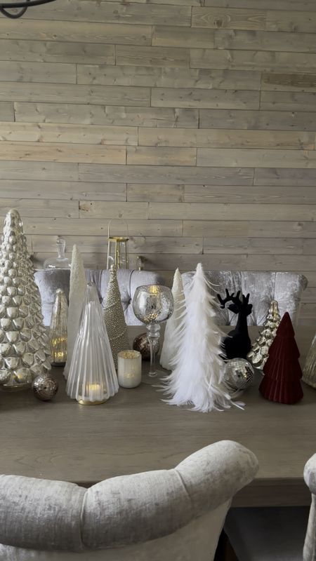 My forest of trees is some thing I look forward to doing every year for my dining room table. I have been collecting these for several years and I love to mix and match every year to make a different look.

Christmas tree tablescape, dining room tablescape, mercury glass tree, glass tree, pottery barn tree, 

#LTKHoliday #LTKfindsunder50 #LTKhome