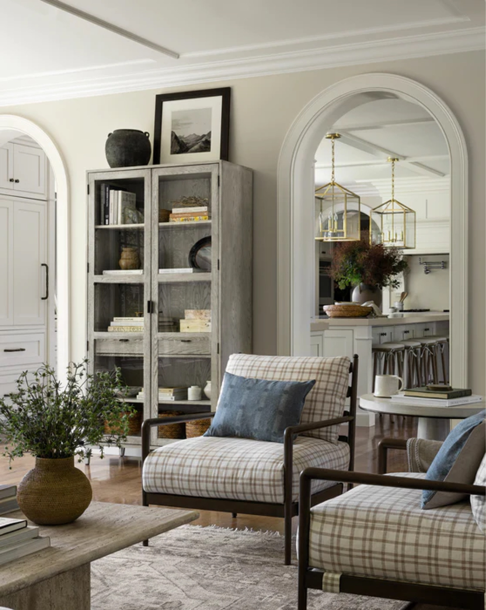 Save up to 30% during the McGee & Co. Black Friday Sale! We love the plaid lounge chairs and travertine coffee table in this space by Studio McGee.

#LTKHoliday #LTKhome #LTKstyletip