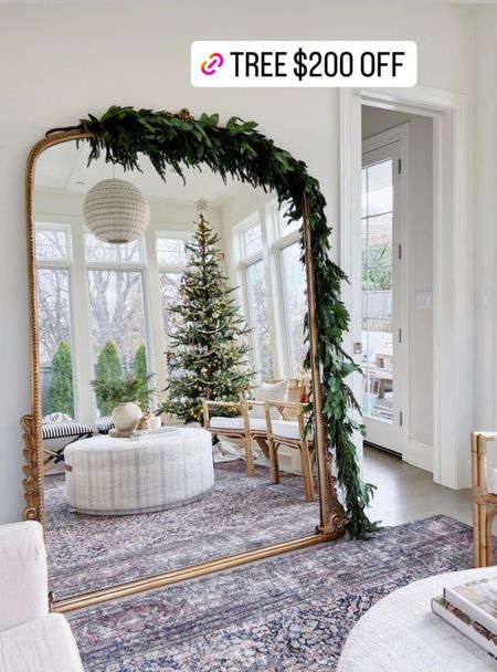 Anthropologie mirror on sale!!! 👏🏽 all sizes get a discount + coupon ♥️ Also, all king of Christmas trees are on sale including the one pictured which I have and it’s gorgeous!!! 🎄

Saw this on IG and had to screenshot 😍 what a beautiful Christmas set up! I love the garland on the Anthropologie mirror! #anthropologie #goldmirror #christmastree #blackfridaydeals #cybermondaydeals #christmastreesonsale

#LTKCyberWeek #LTKhome #LTKHoliday