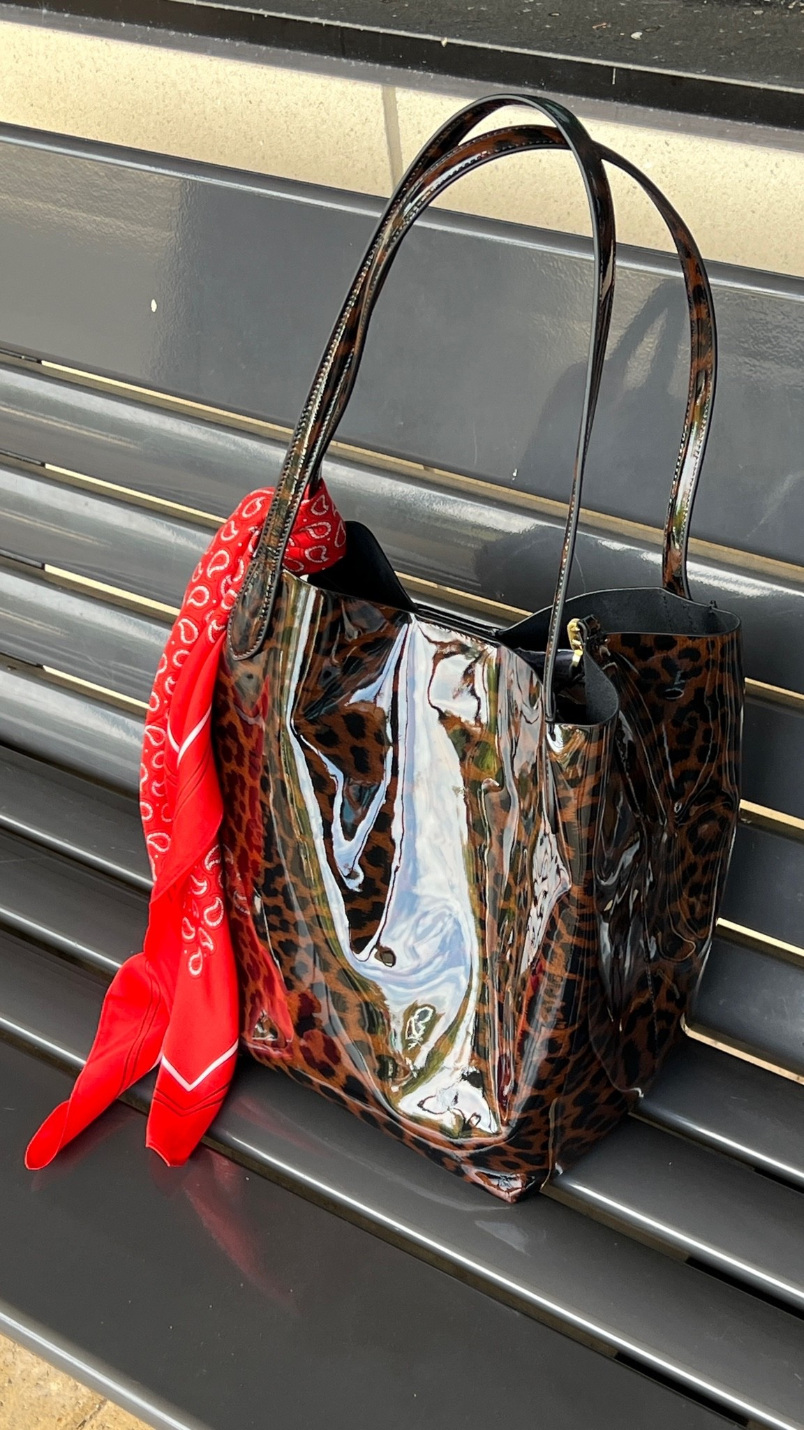 Fall bag! Leopard print patent leather bag with red print scarf for a pop of color.

#LTKootd