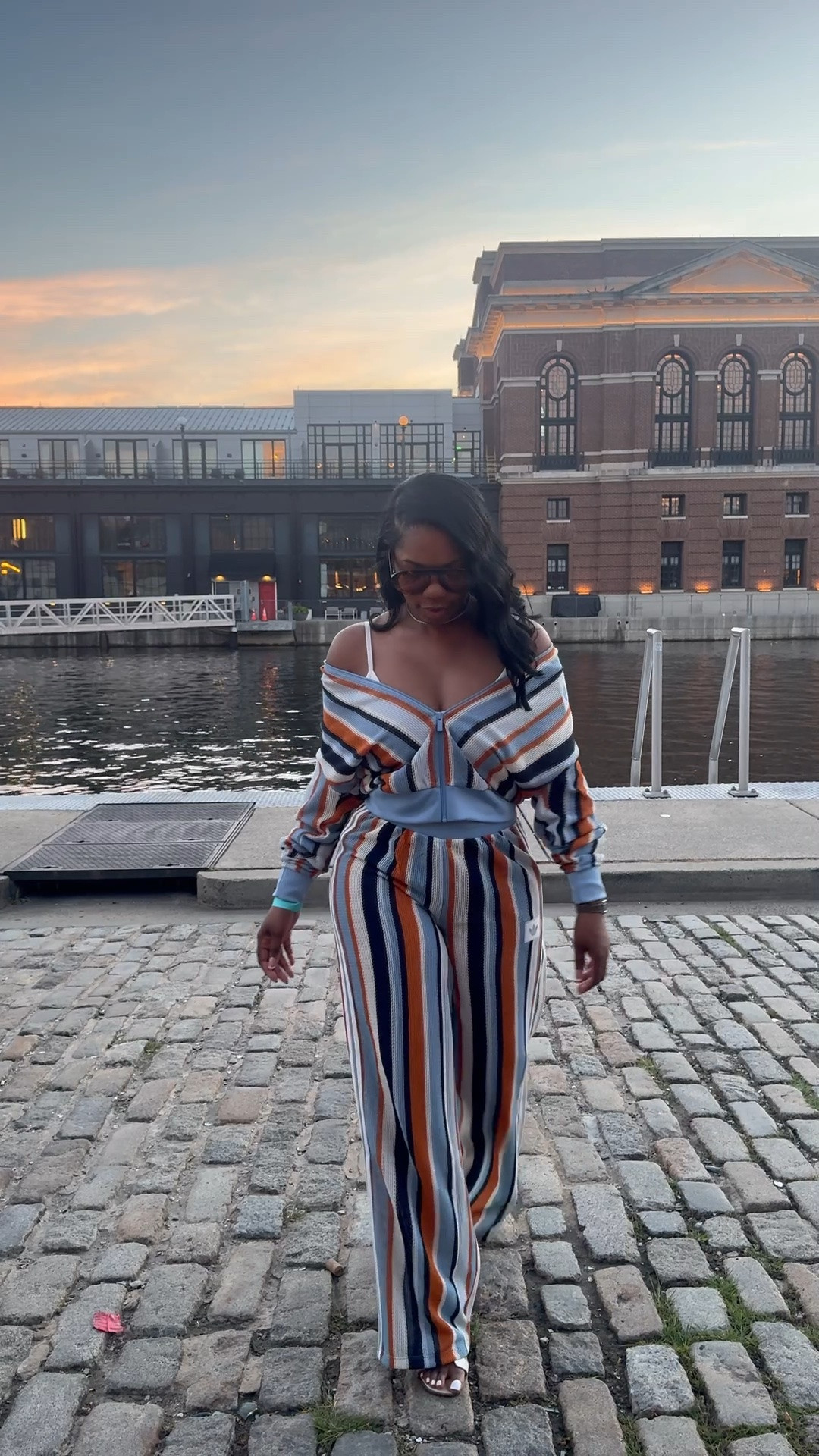 Enjoying this @adidas summer glow set on a beautiful night. Very lightweight and comfortable. Came be dressed up or down. Grab yours before it’s gone! I’m wearing a size XS top and M bottom. 

#summeroutfit #datenightoutfit #outfitinspo #adidastyle

#LTKootd